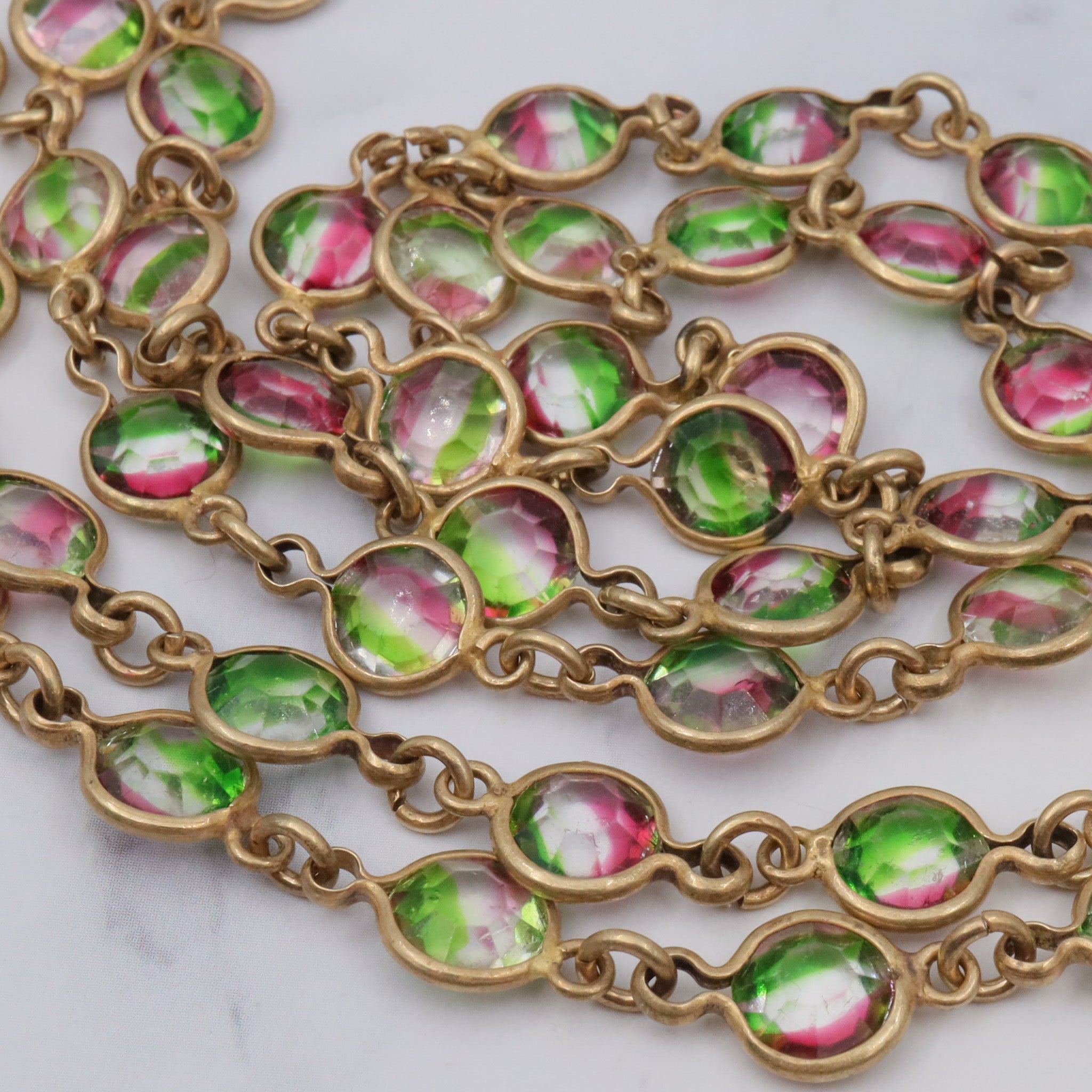 Vintage Austrian watermelon crystal bezel set brass necklace, 46”