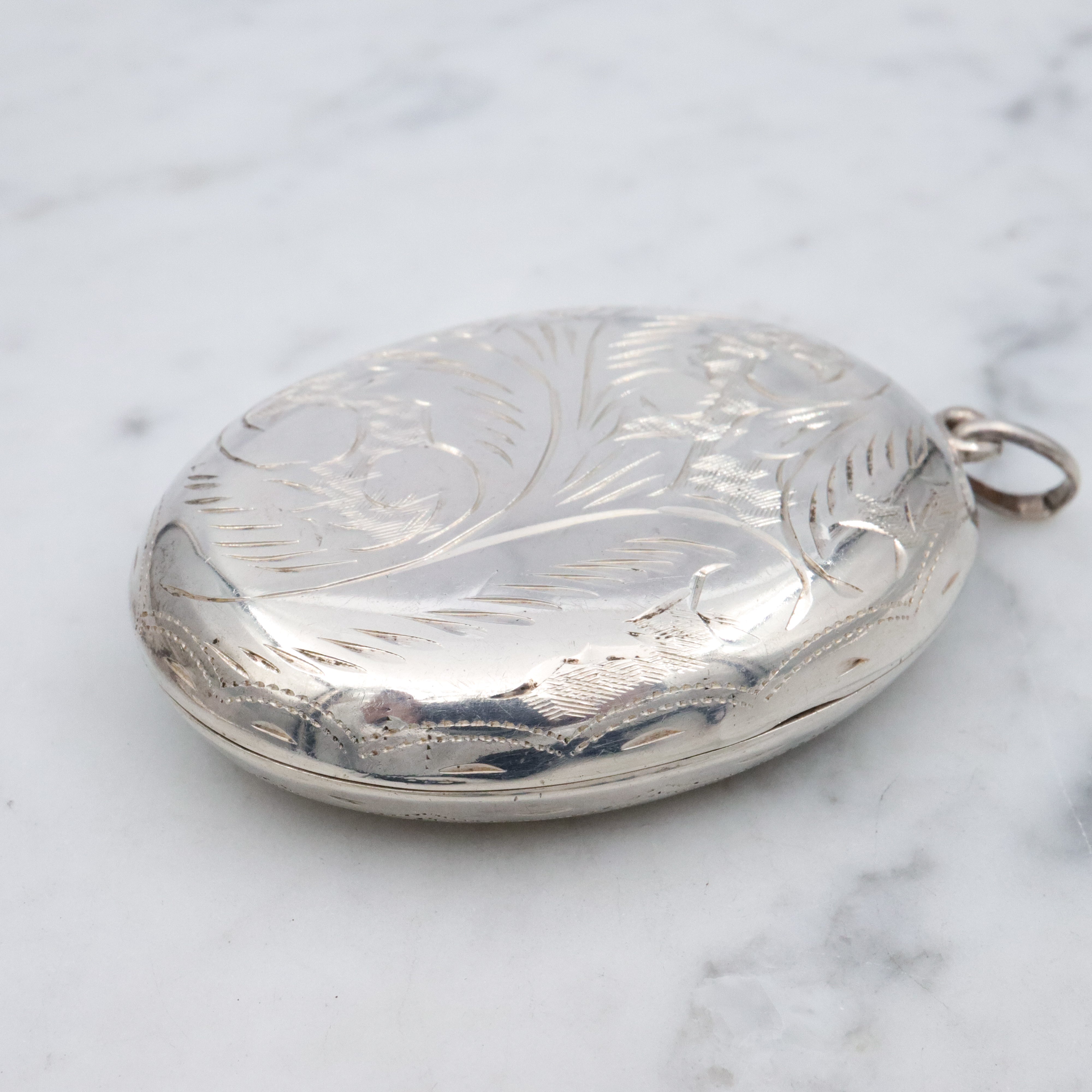 Vintage large floral engraved sterling locket pendant