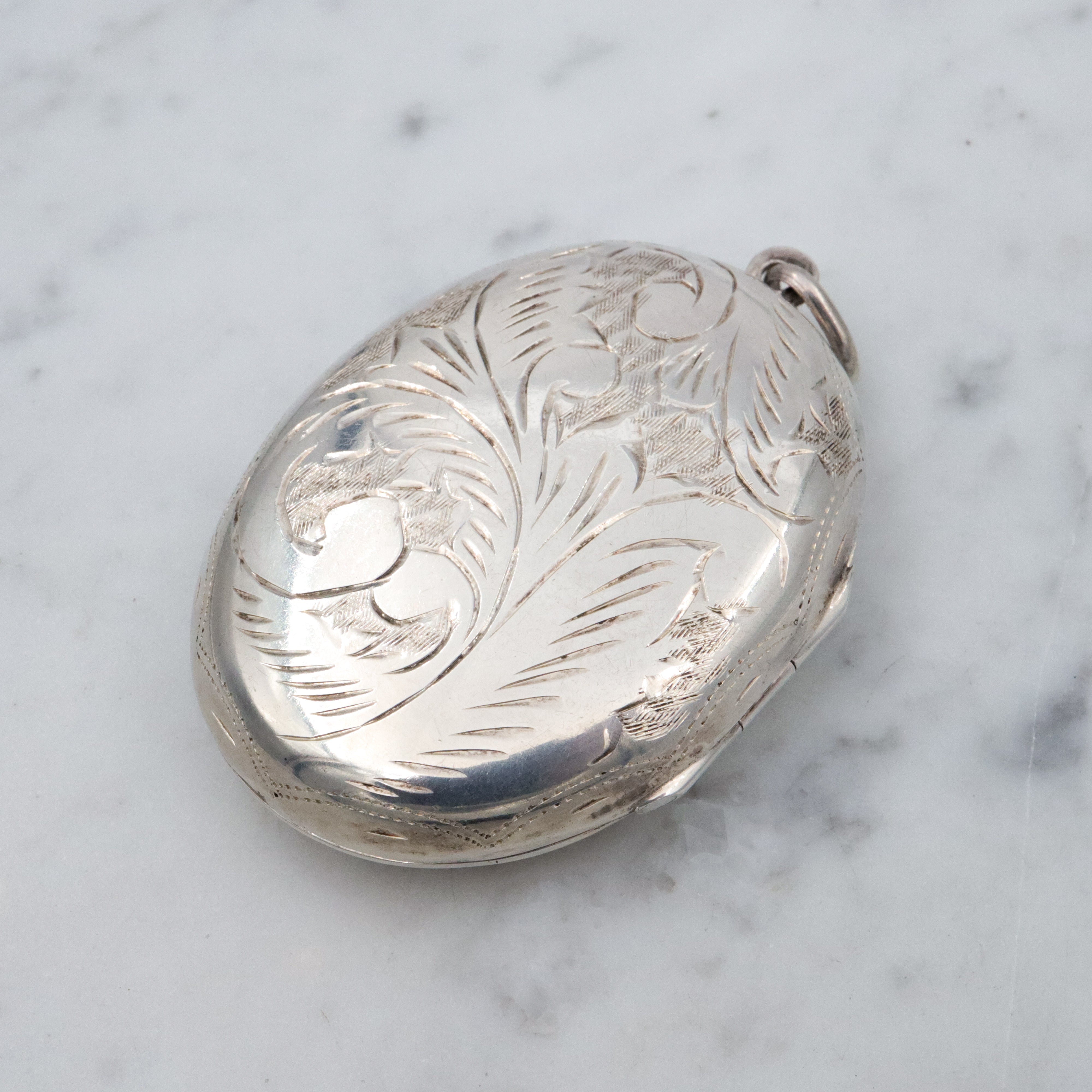 Vintage large floral engraved sterling locket pendant