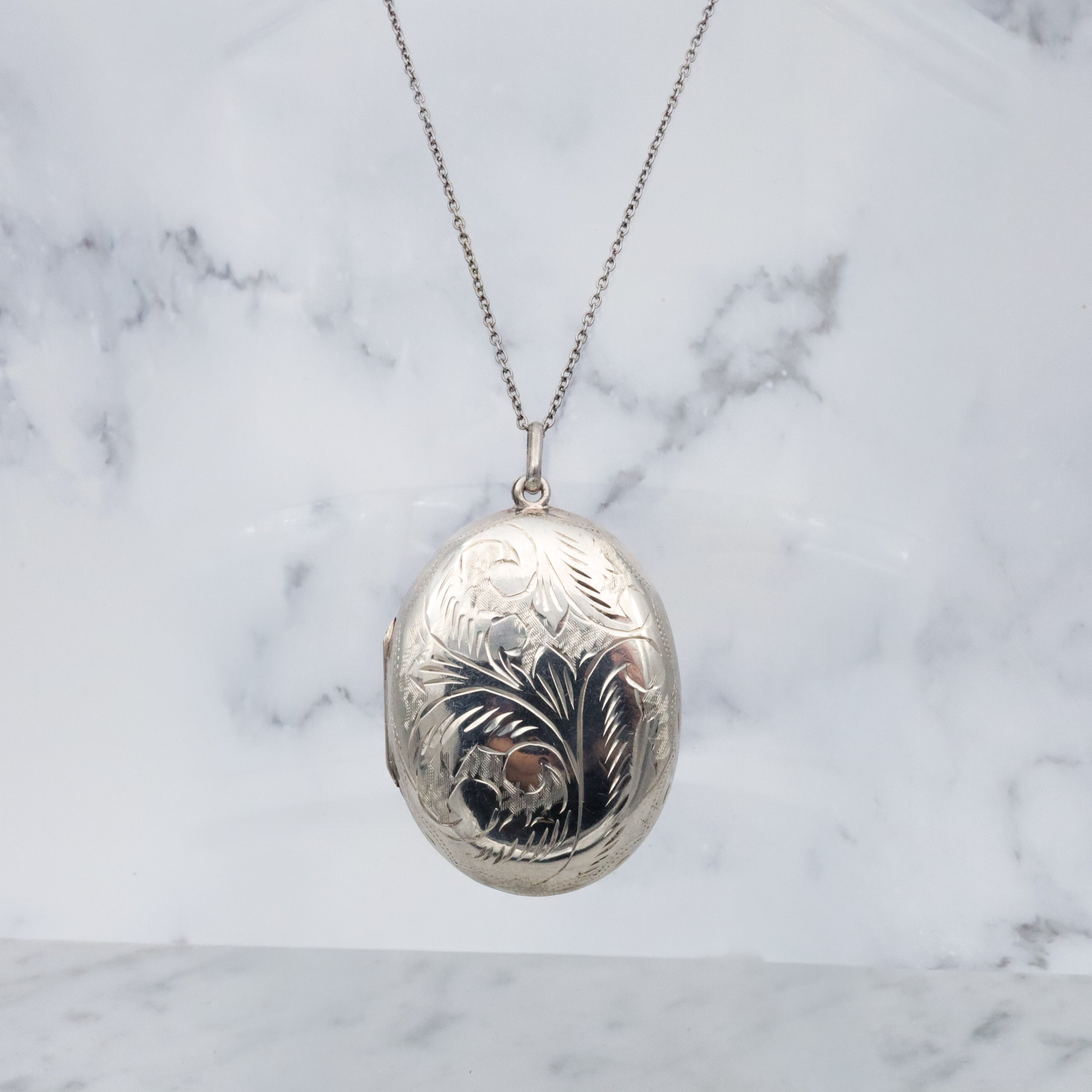 Vintage large floral engraved sterling locket pendant