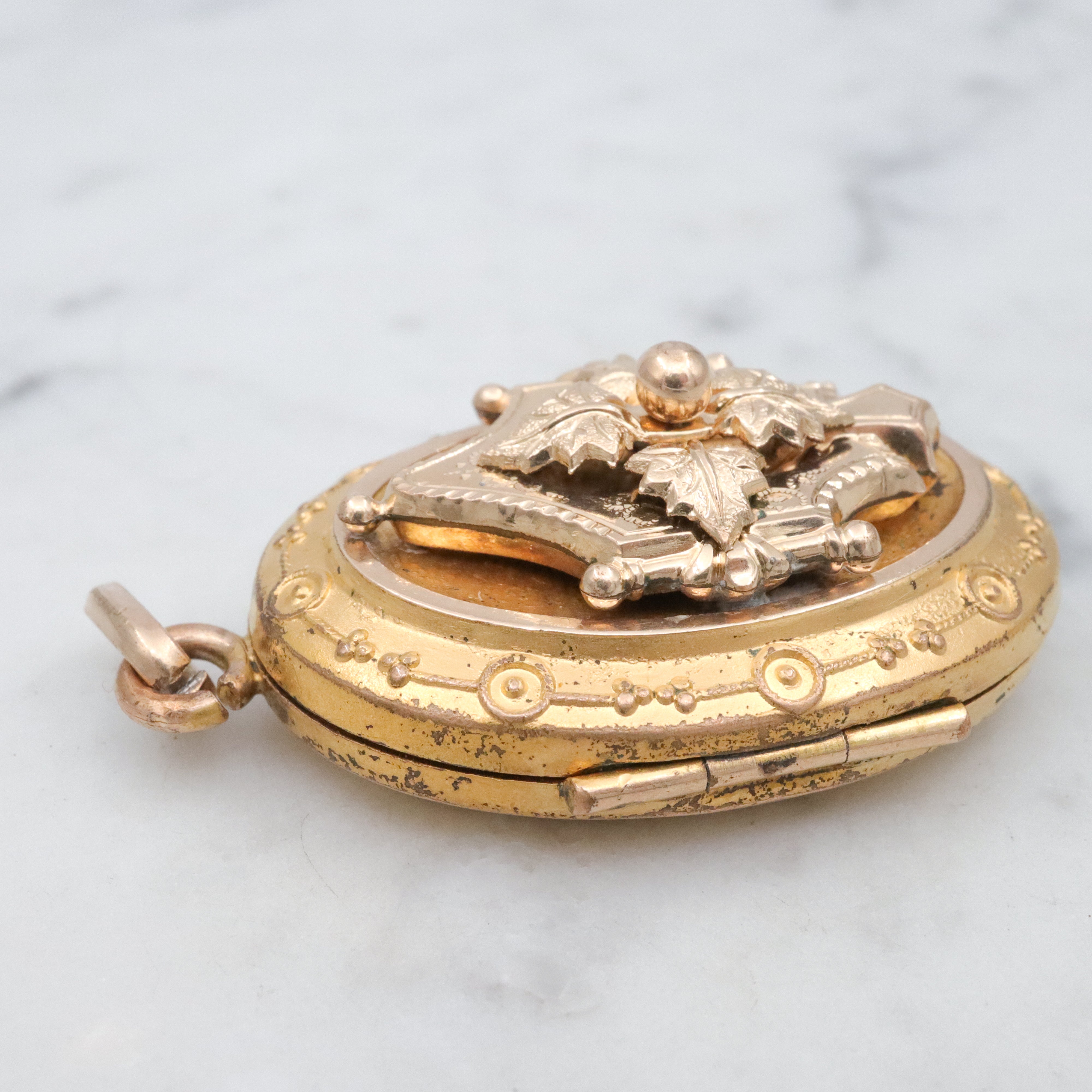 Antique Victorian gold filled & gilt metal Etruscan Revival locket pendant