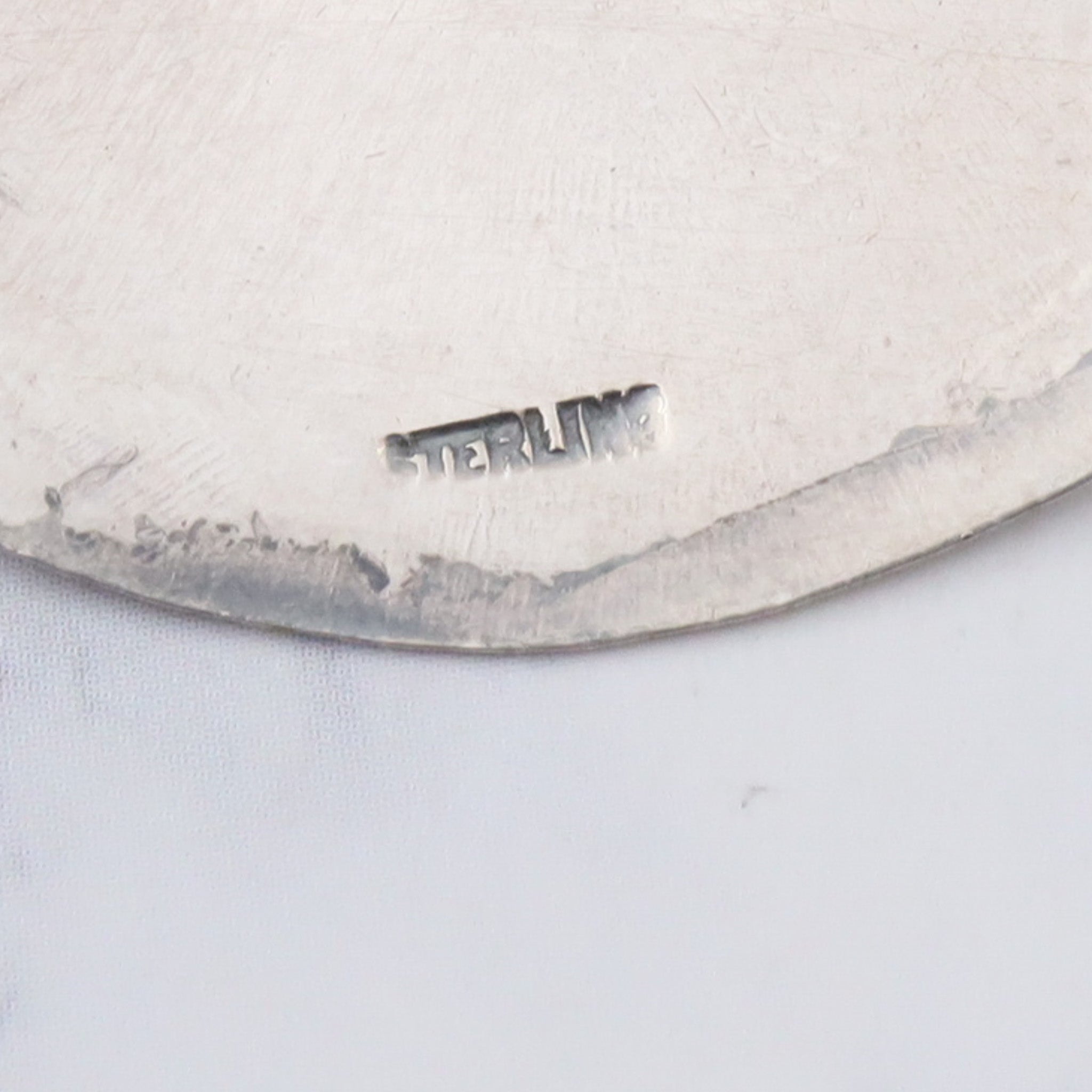 Vintage sterling face brooch