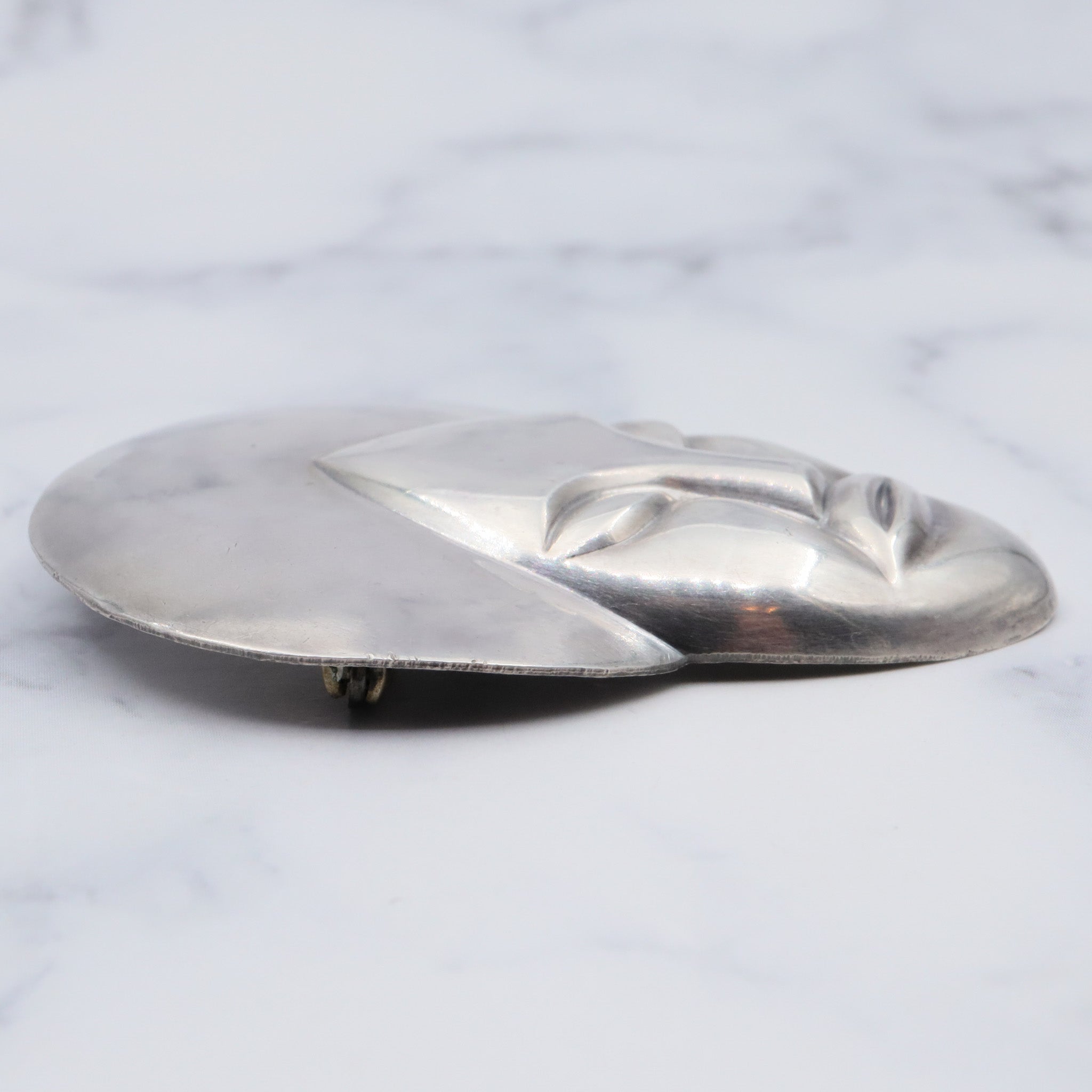 Vintage sterling face brooch