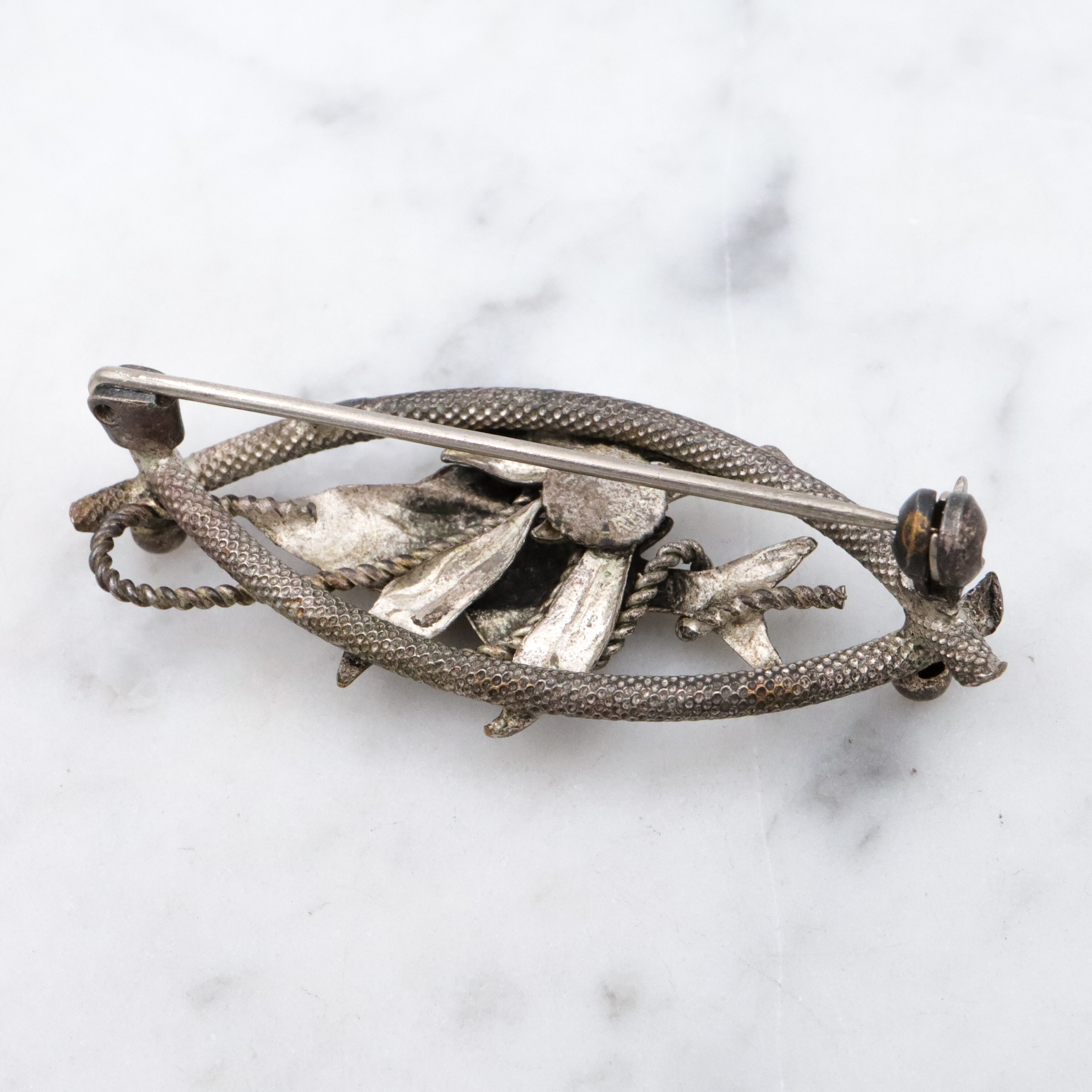 Vintage 1950s Western Germany "fish caught on a rope" silver plated brooch