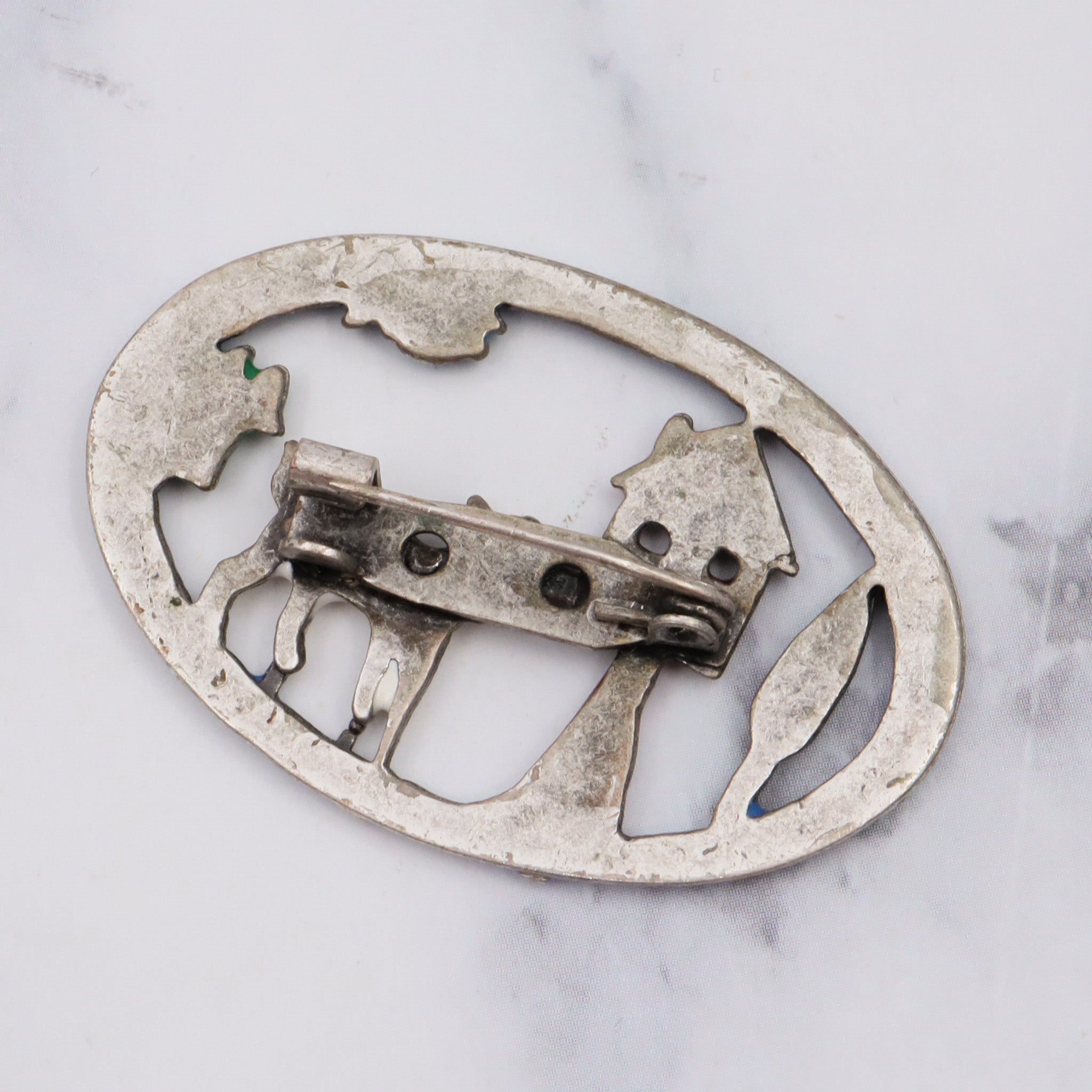 Antique silver tone enamel brooch