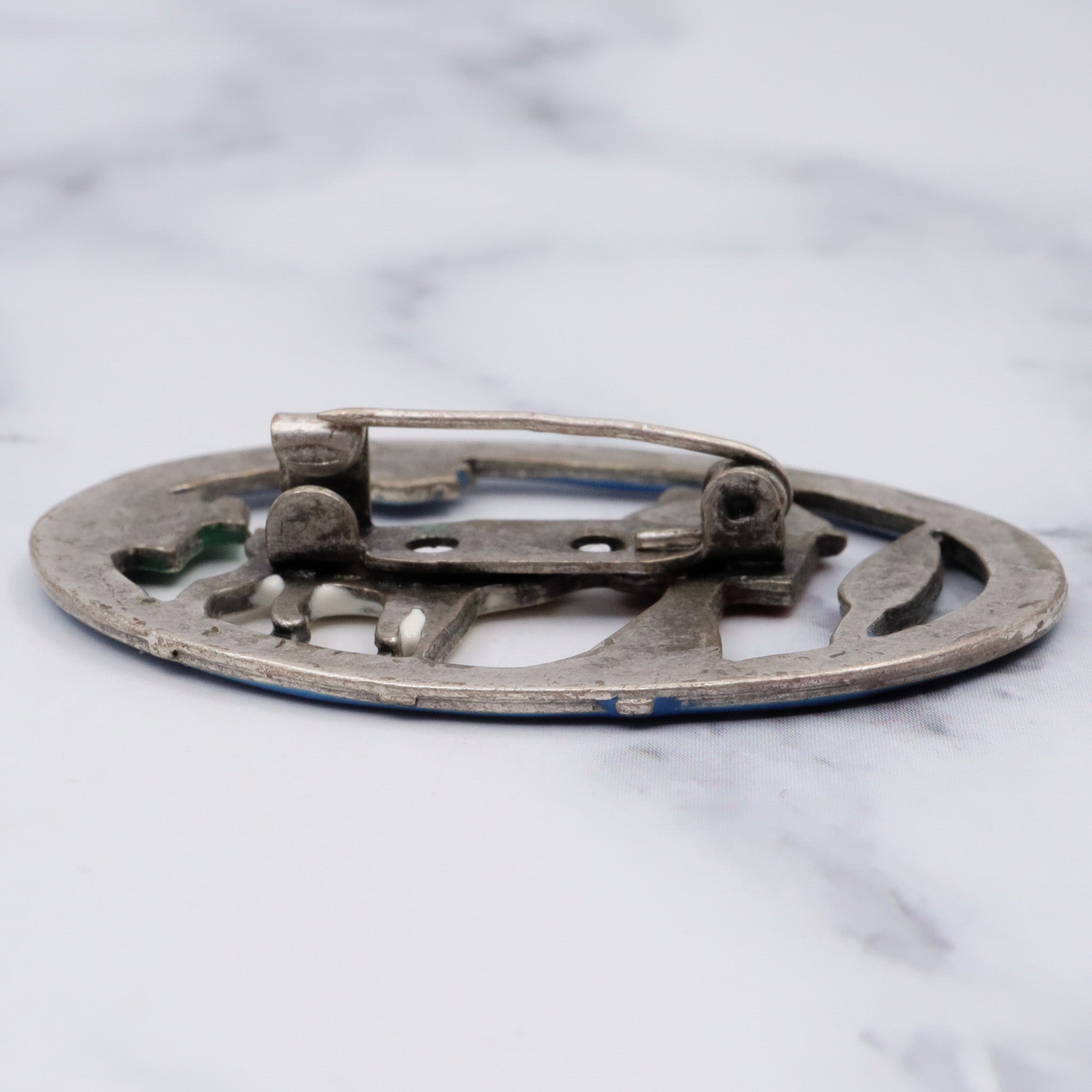 Antique silver tone enamel brooch
