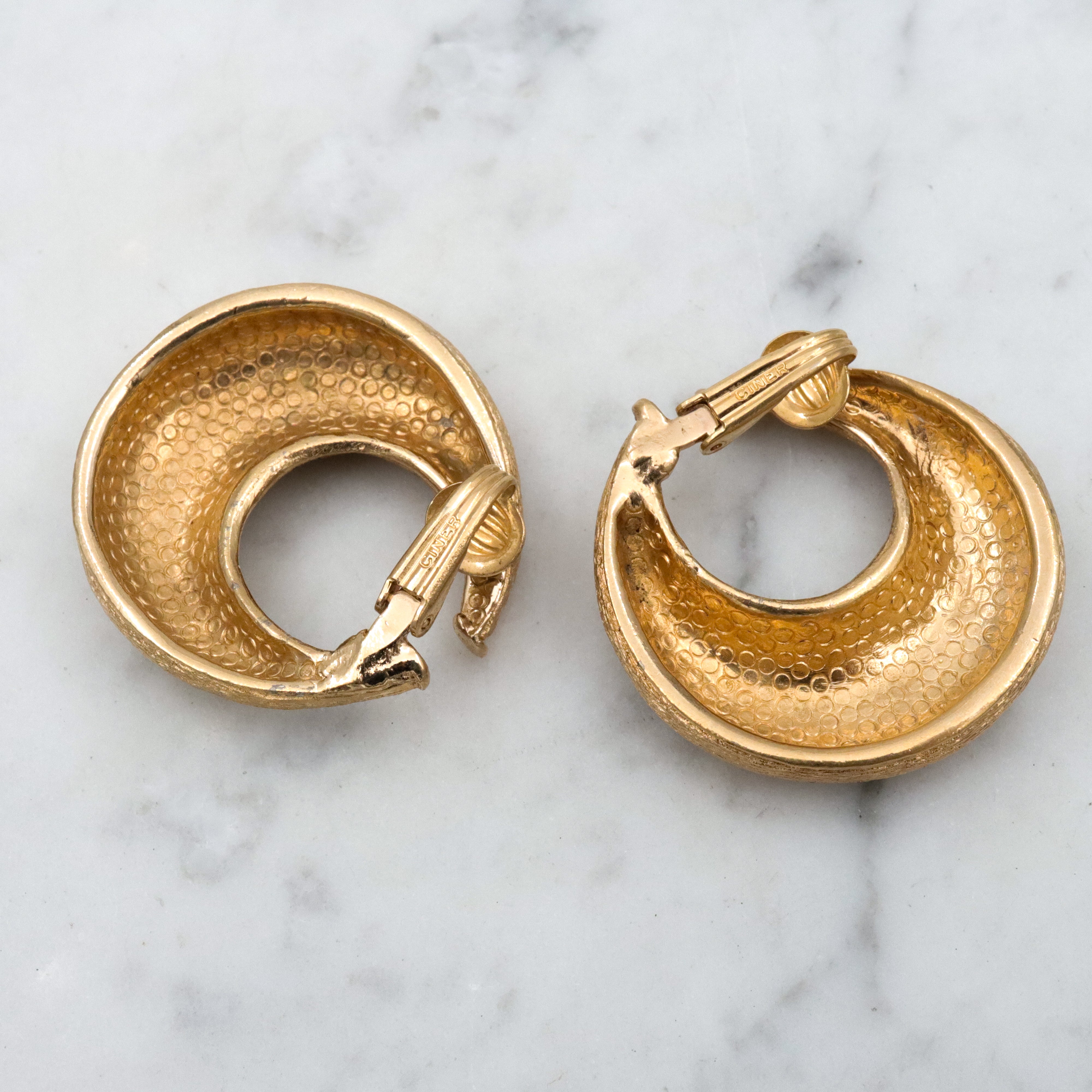 Vintage 70s Ciner textured gold plated flattened hoop huggie clip-on earrings