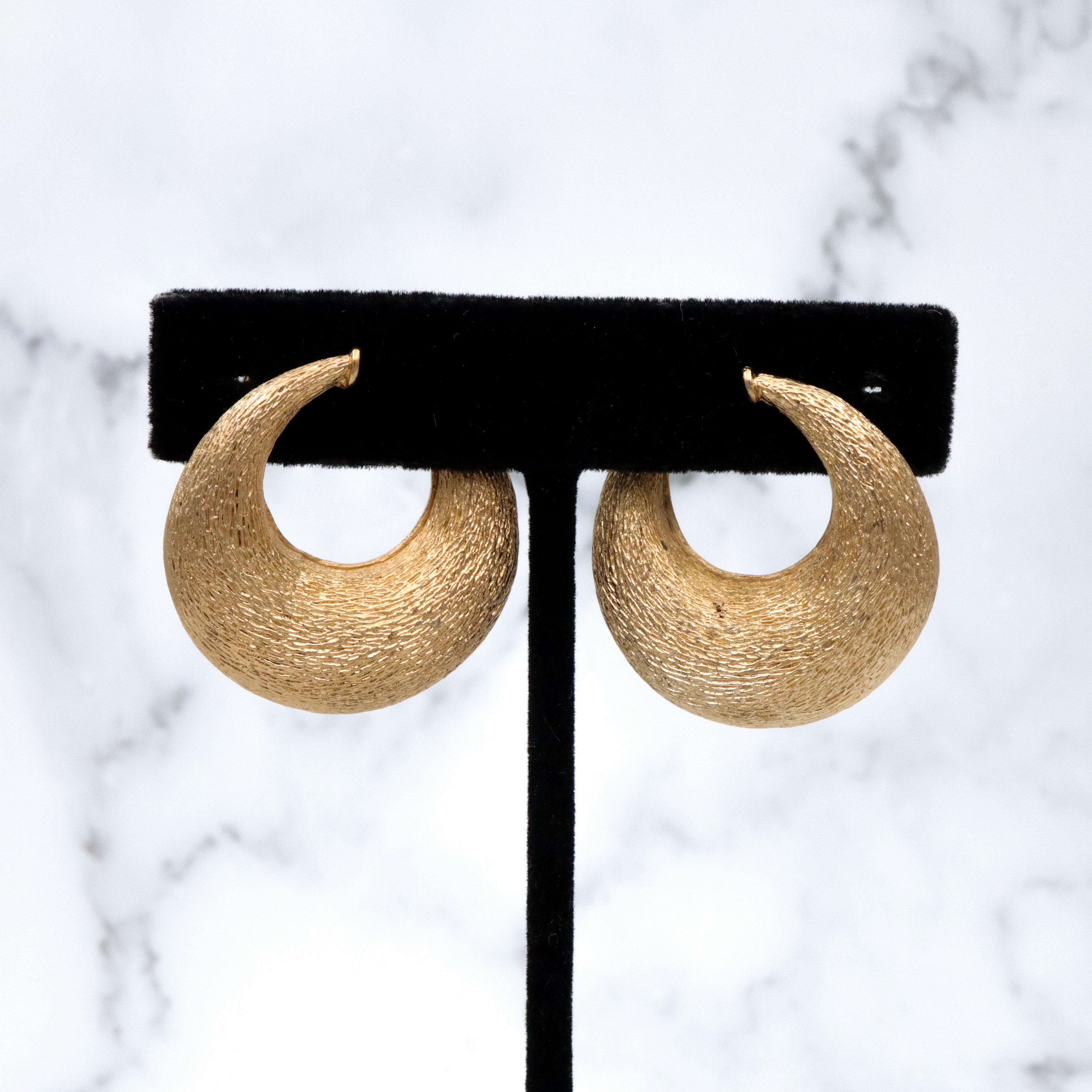 Vintage 70s Ciner textured gold plated flattened hoop huggie clip-on earrings