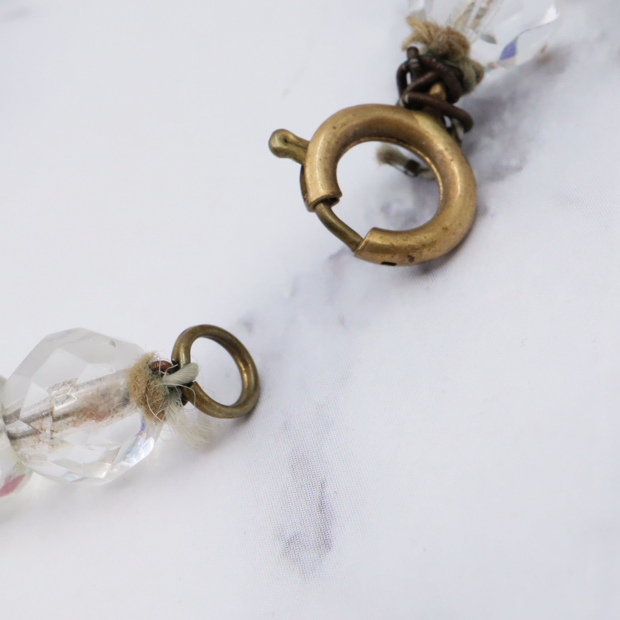 Antique rainbow glass beaded necklace with brass spacers, 16.5