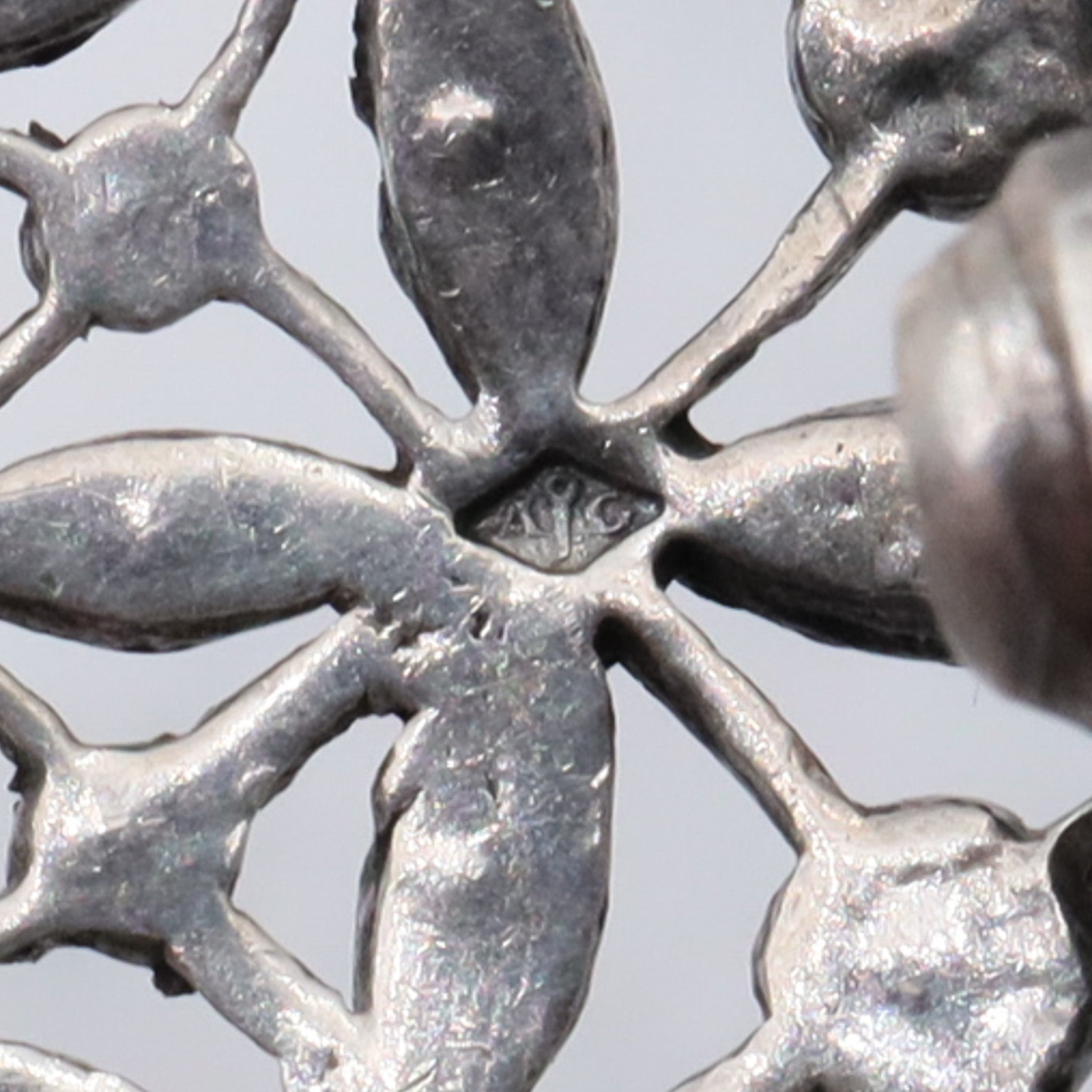 Antique French Art Deco .900 silver & paste filigree circle brooch by Andre Godefroy