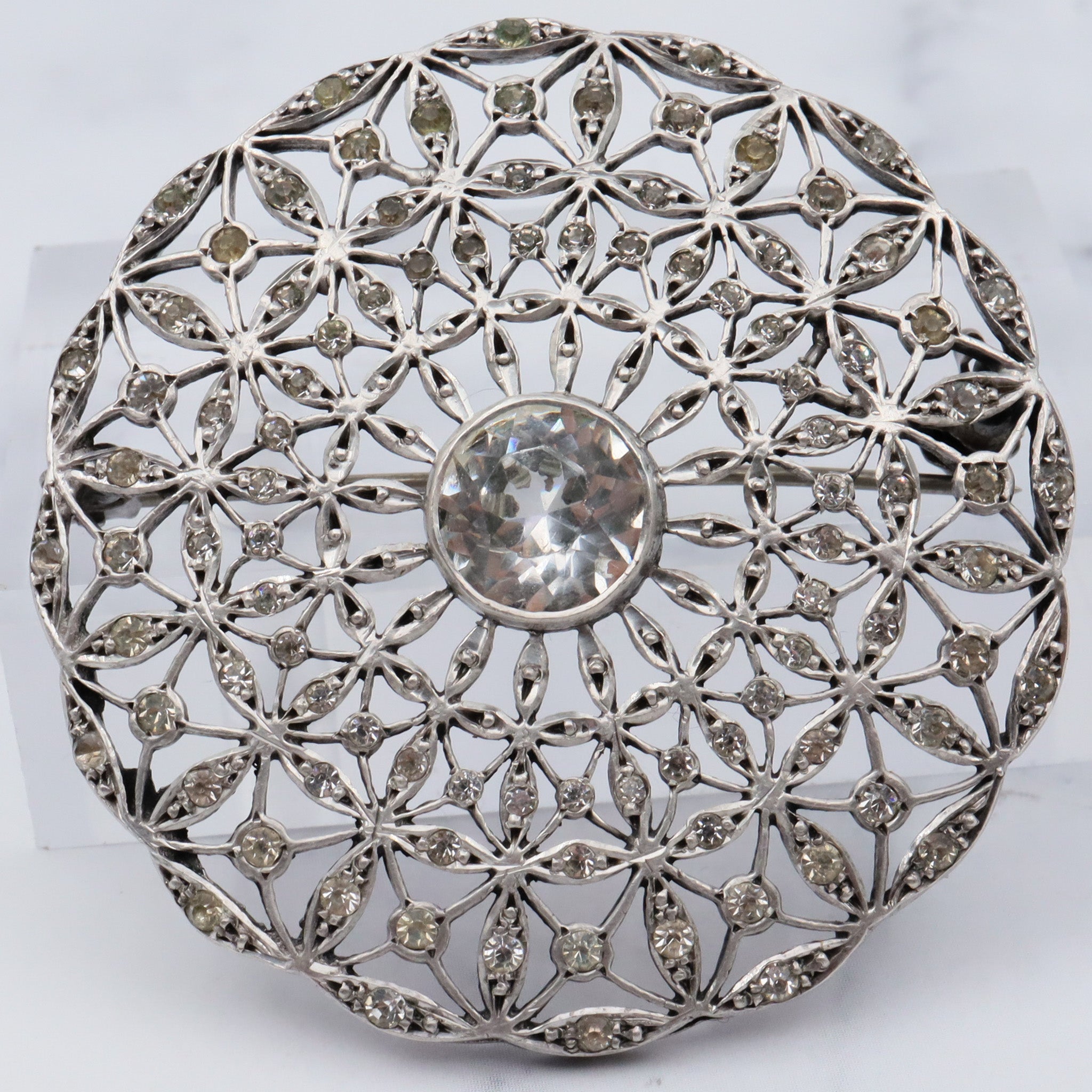Antique French Art Deco .900 silver & paste filigree circle brooch by Andre Godefroy