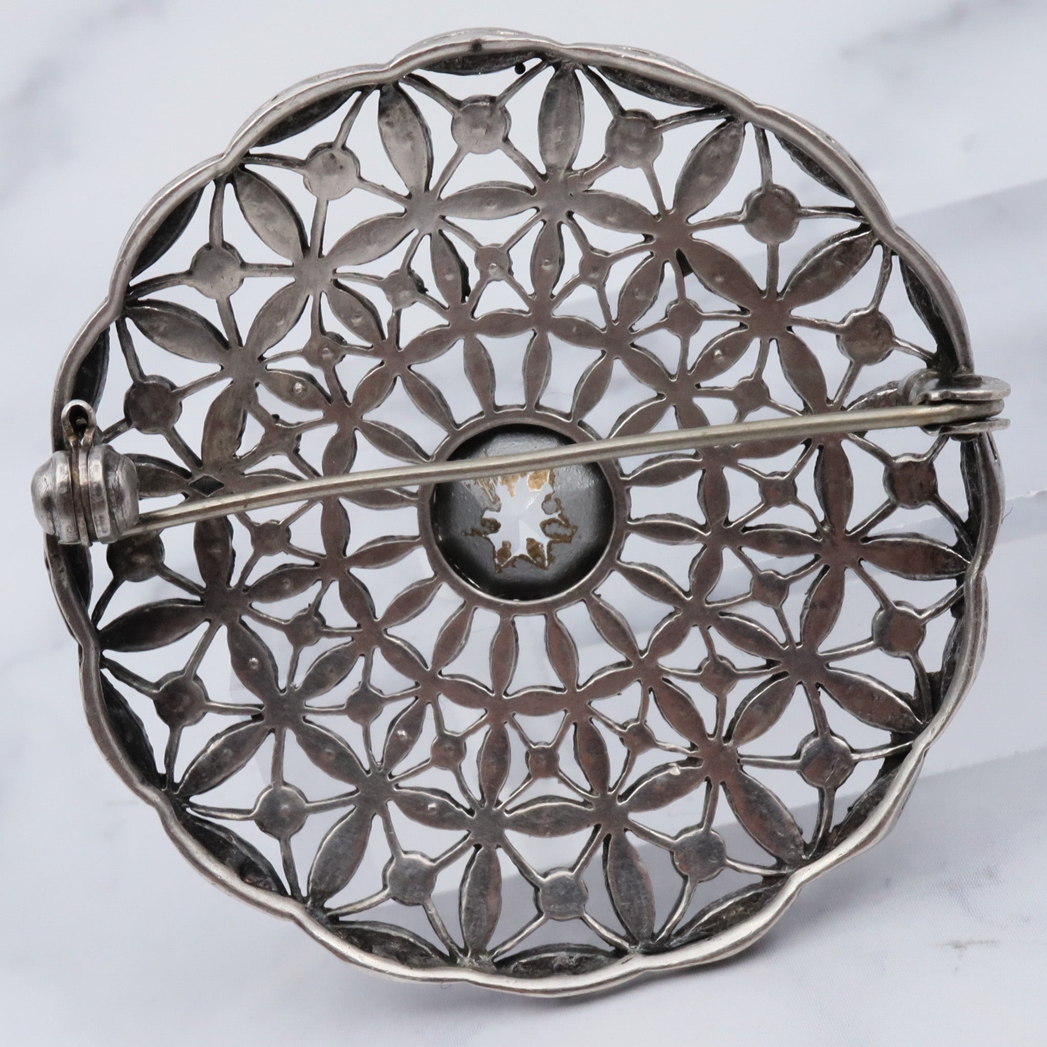 Antique French Art Deco .900 silver & paste filigree circle brooch by Andre Godefroy