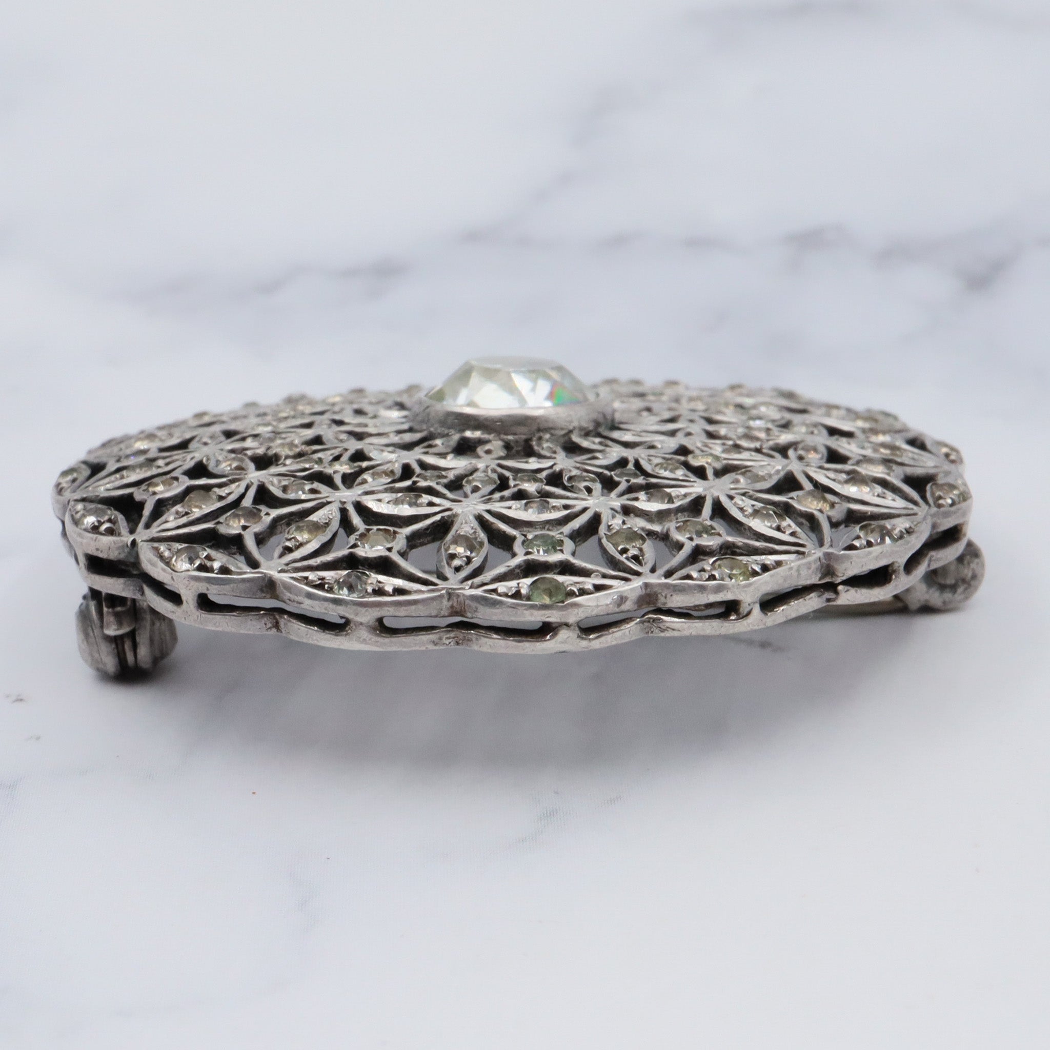 Antique French Art Deco .900 silver & paste filigree circle brooch by Andre Godefroy