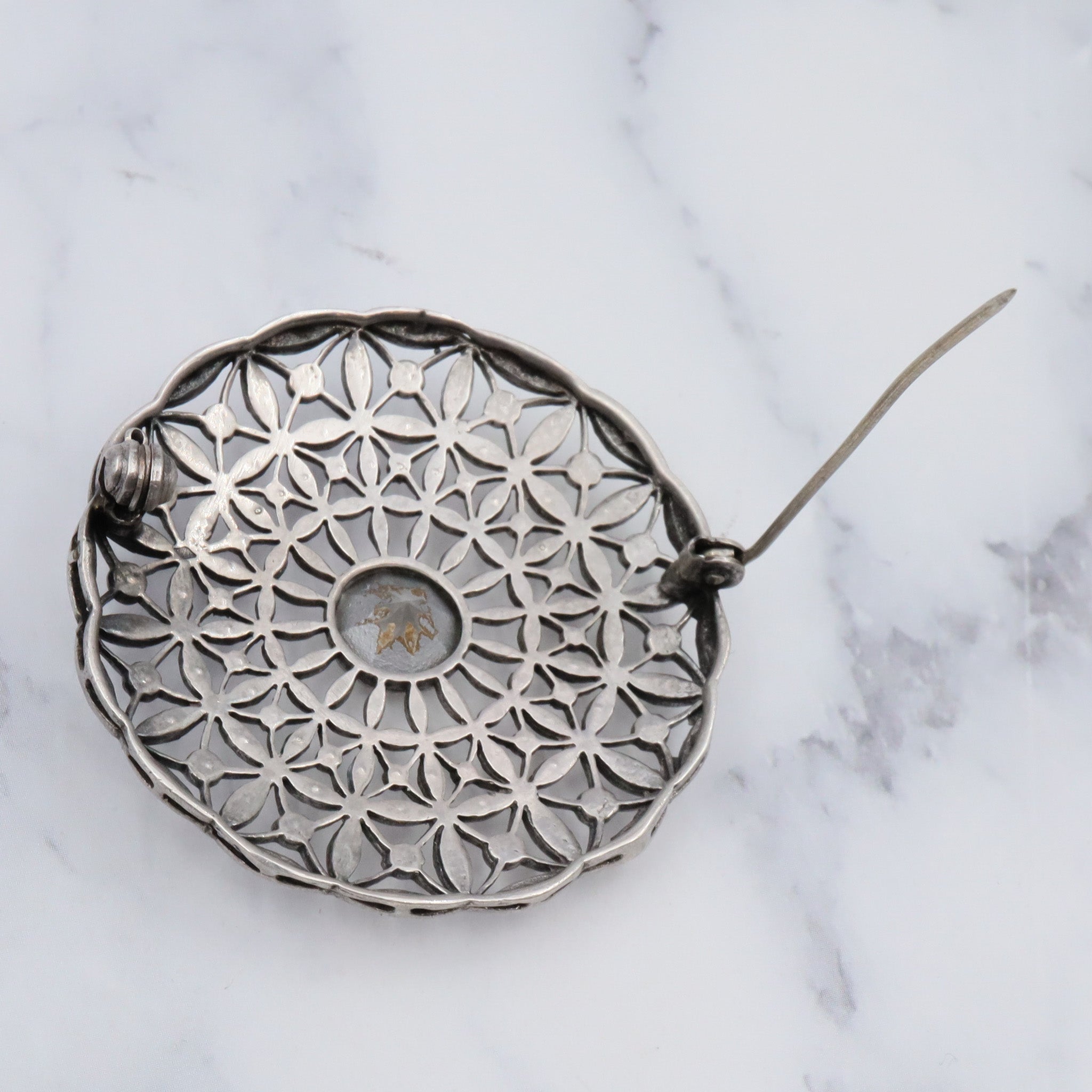 Antique French Art Deco .900 silver & paste filigree circle brooch by Andre Godefroy