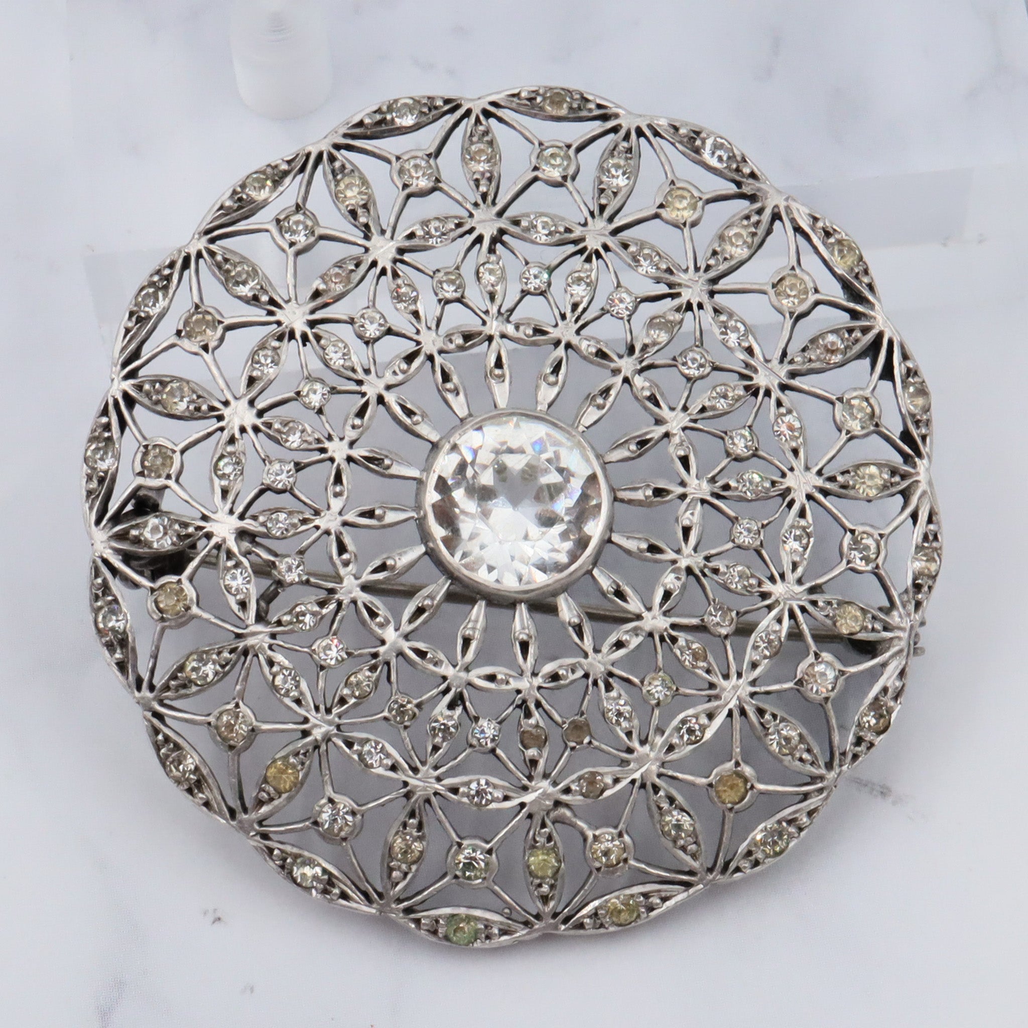 Antique French Art Deco .900 silver & paste filigree circle brooch by Andre Godefroy