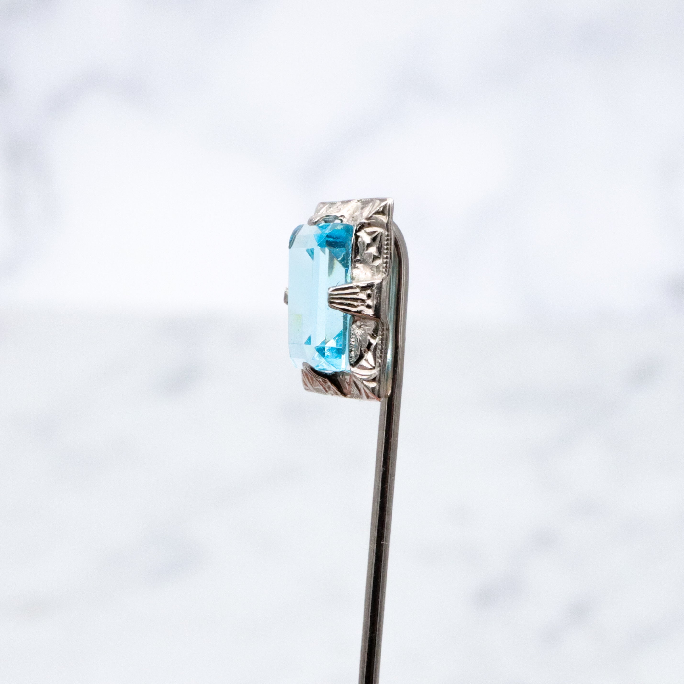 Antique Art Deco Ostby Barton 10k white gold faux aquamarine stick pin