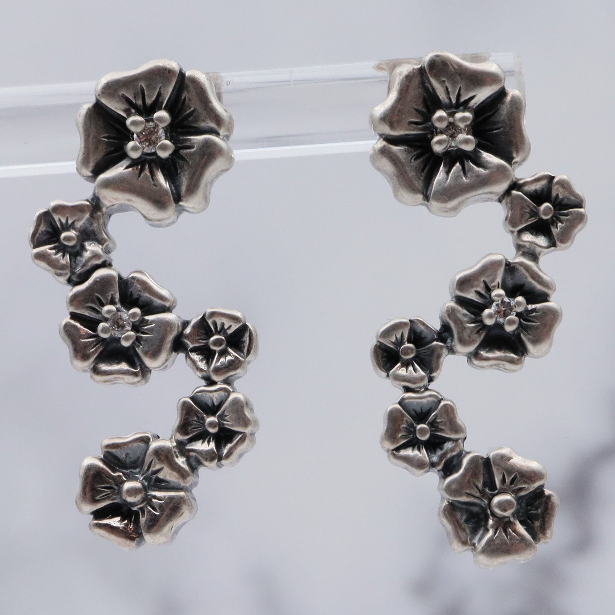 Vintage sterling & diamond flower earrings by “Lyric”