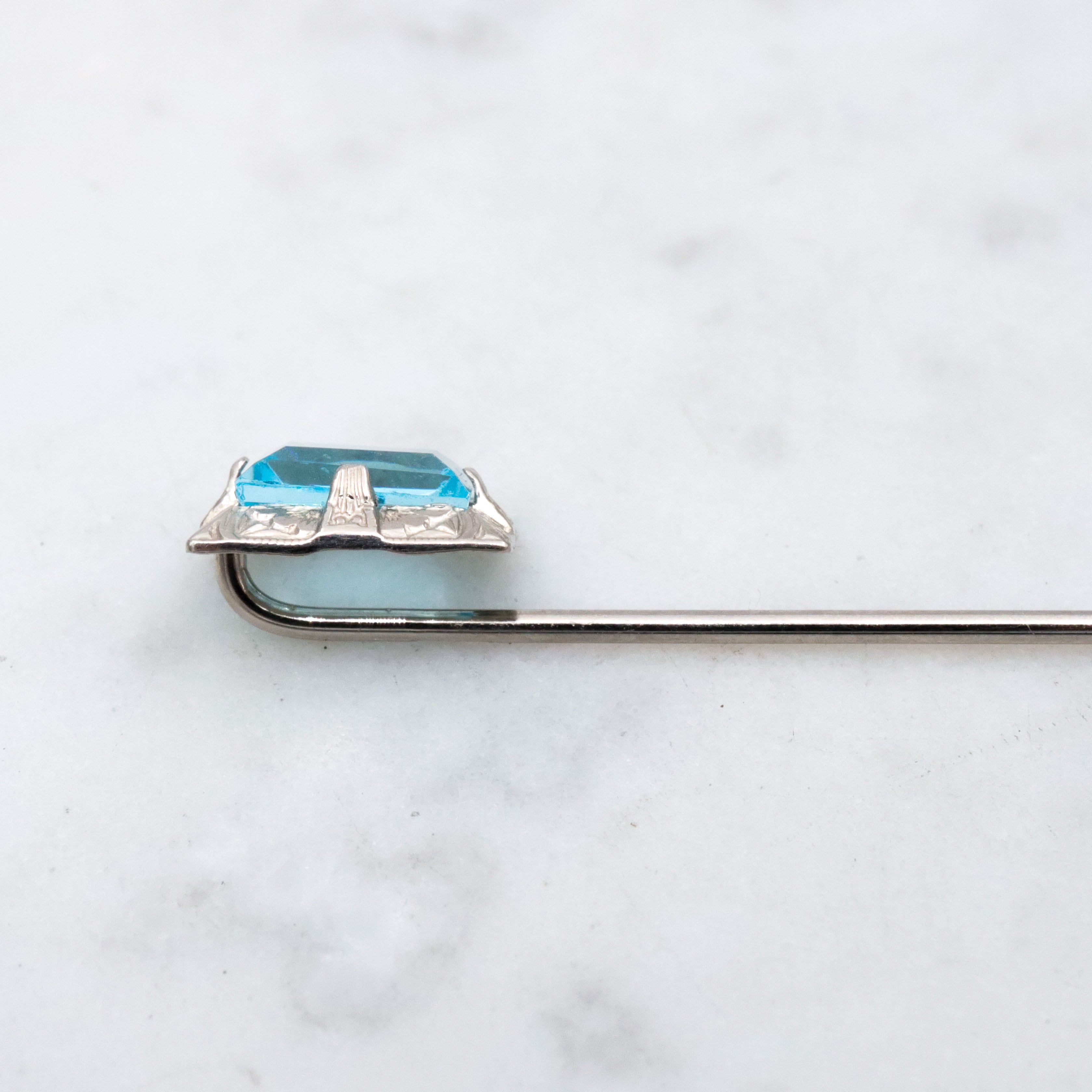 Antique Art Deco Ostby Barton 10k white gold faux aquamarine stick pin