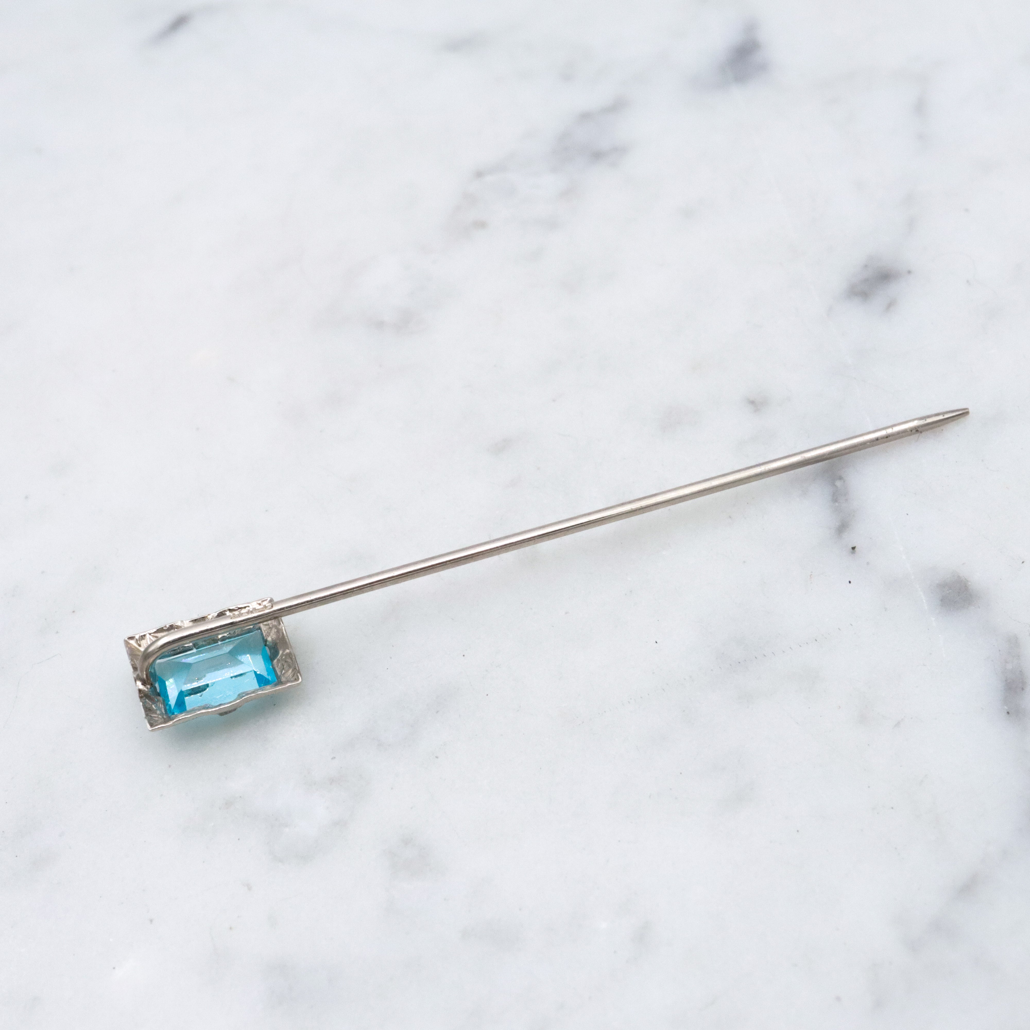 Antique Art Deco Ostby Barton 10k white gold faux aquamarine stick pin