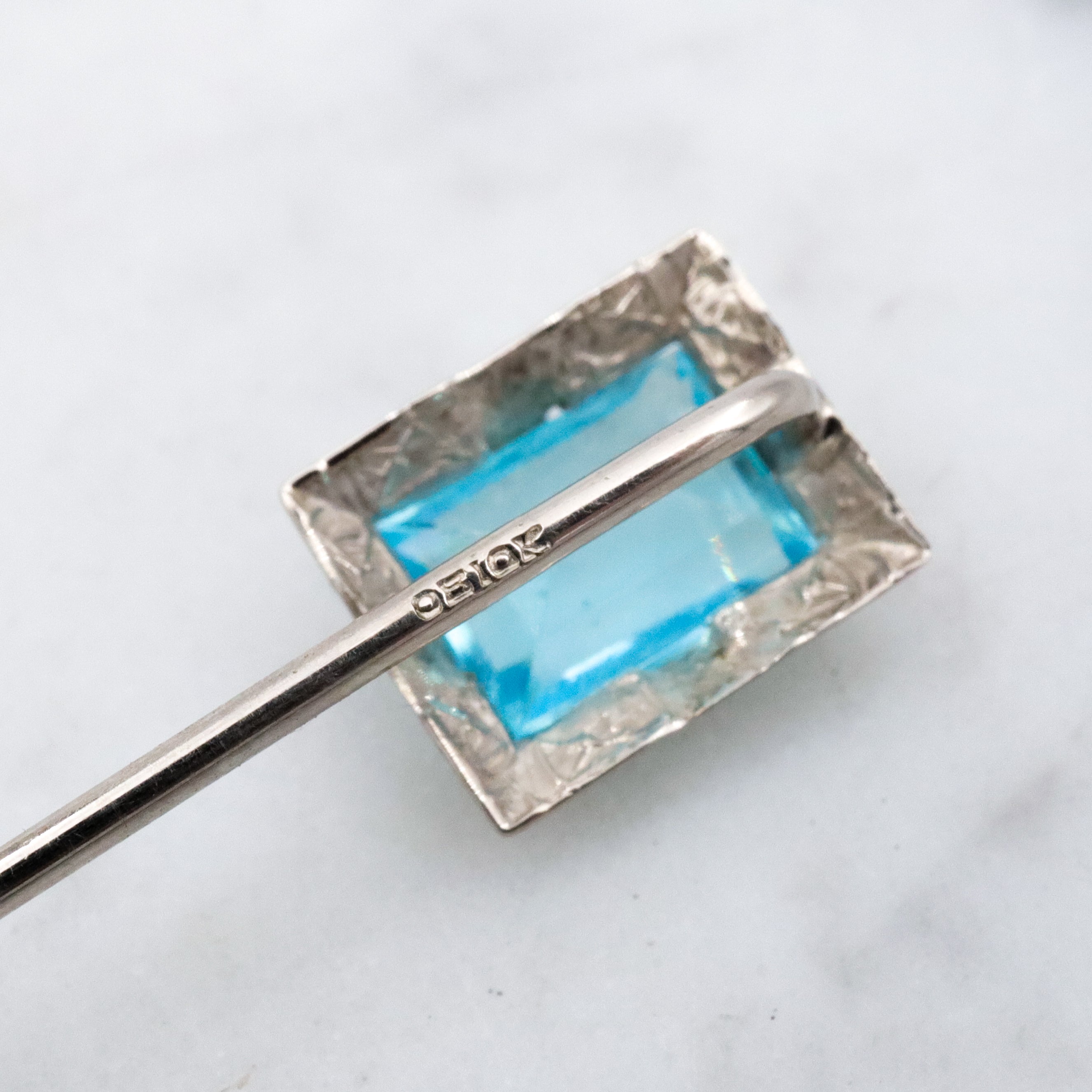 Antique Art Deco Ostby Barton 10k white gold faux aquamarine stick pin
