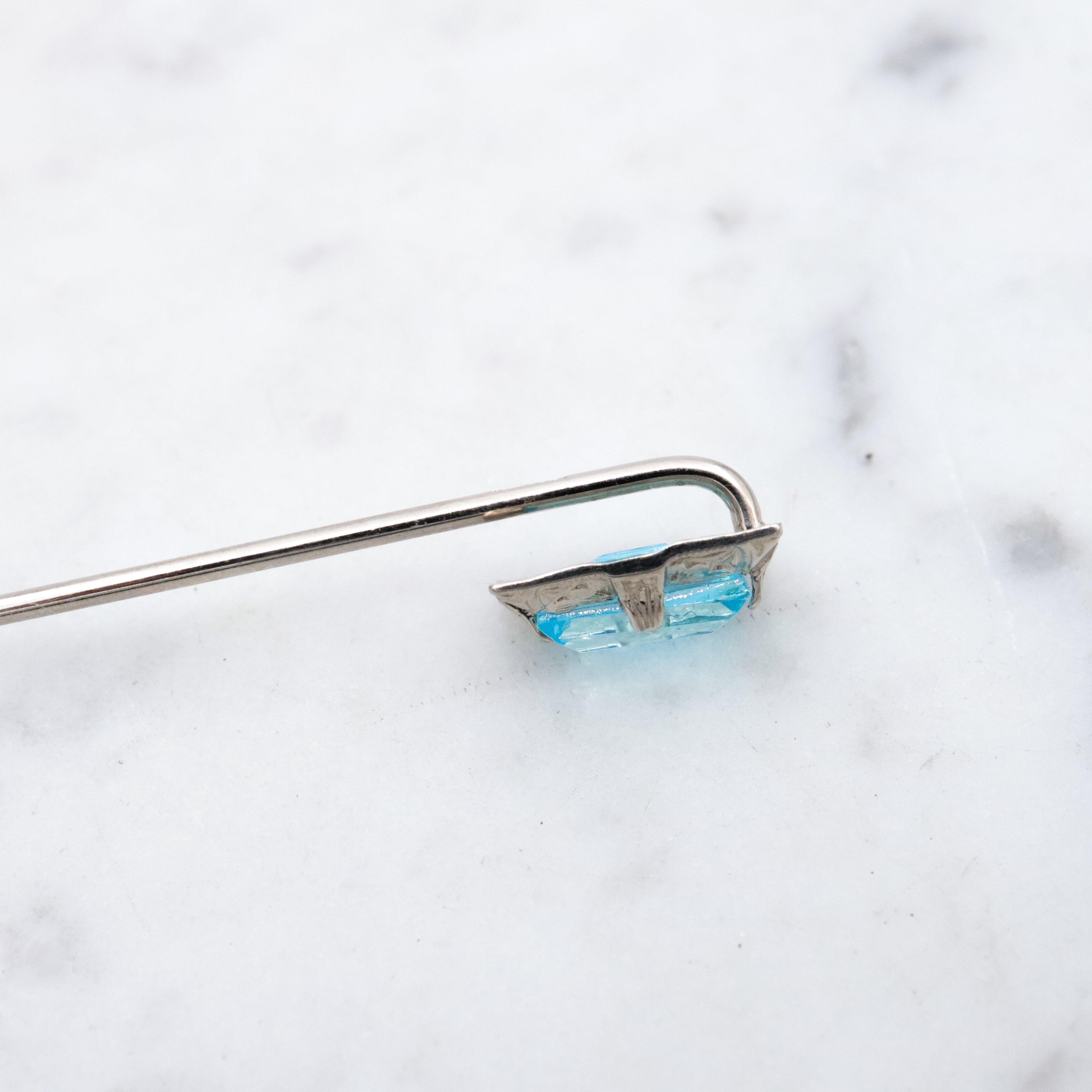 Antique Art Deco Ostby Barton 10k white gold faux aquamarine stick pin