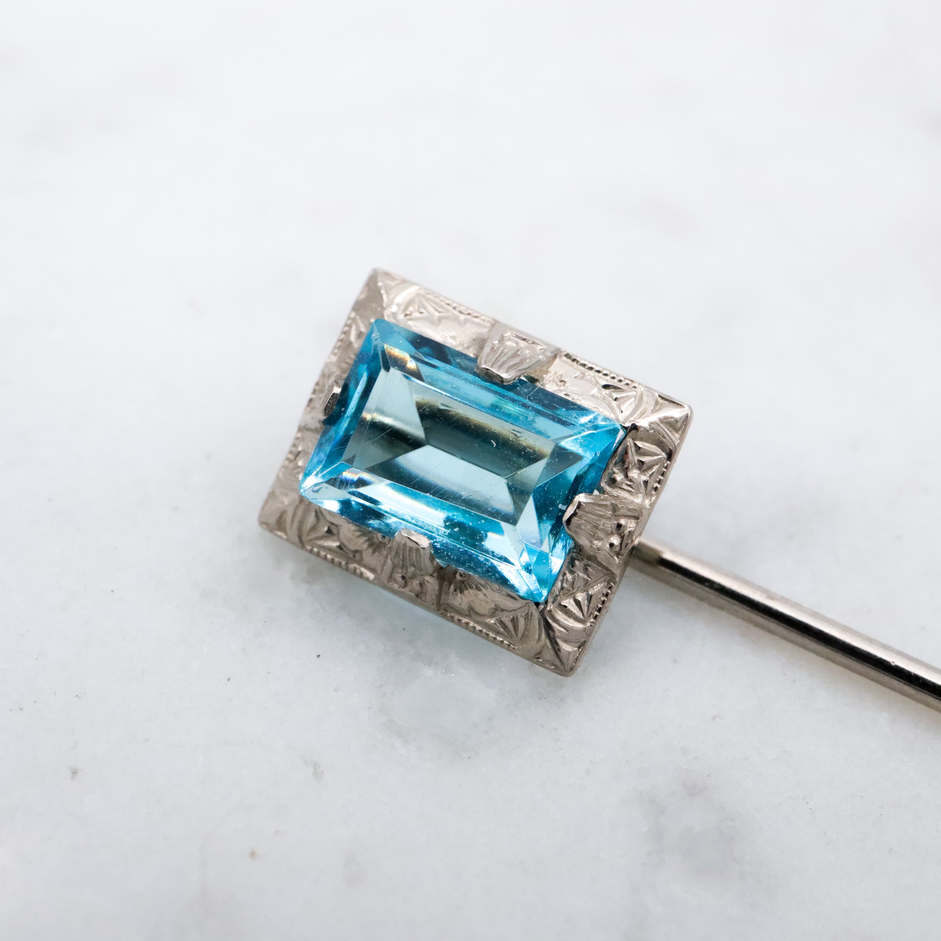 Antique Art Deco Ostby Barton 10k white gold faux aquamarine stick pin