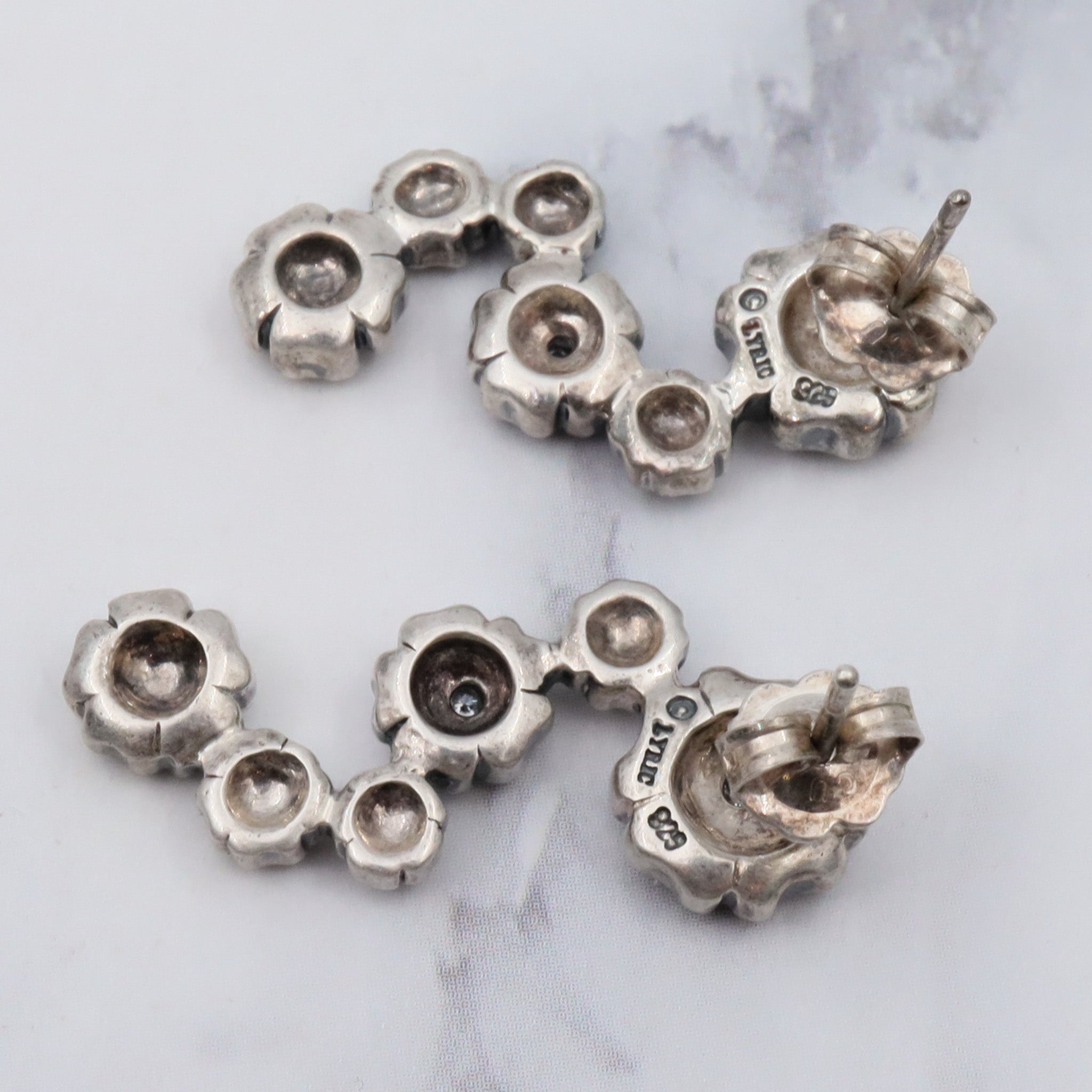 Vintage sterling & diamond flower earrings by “Lyric”