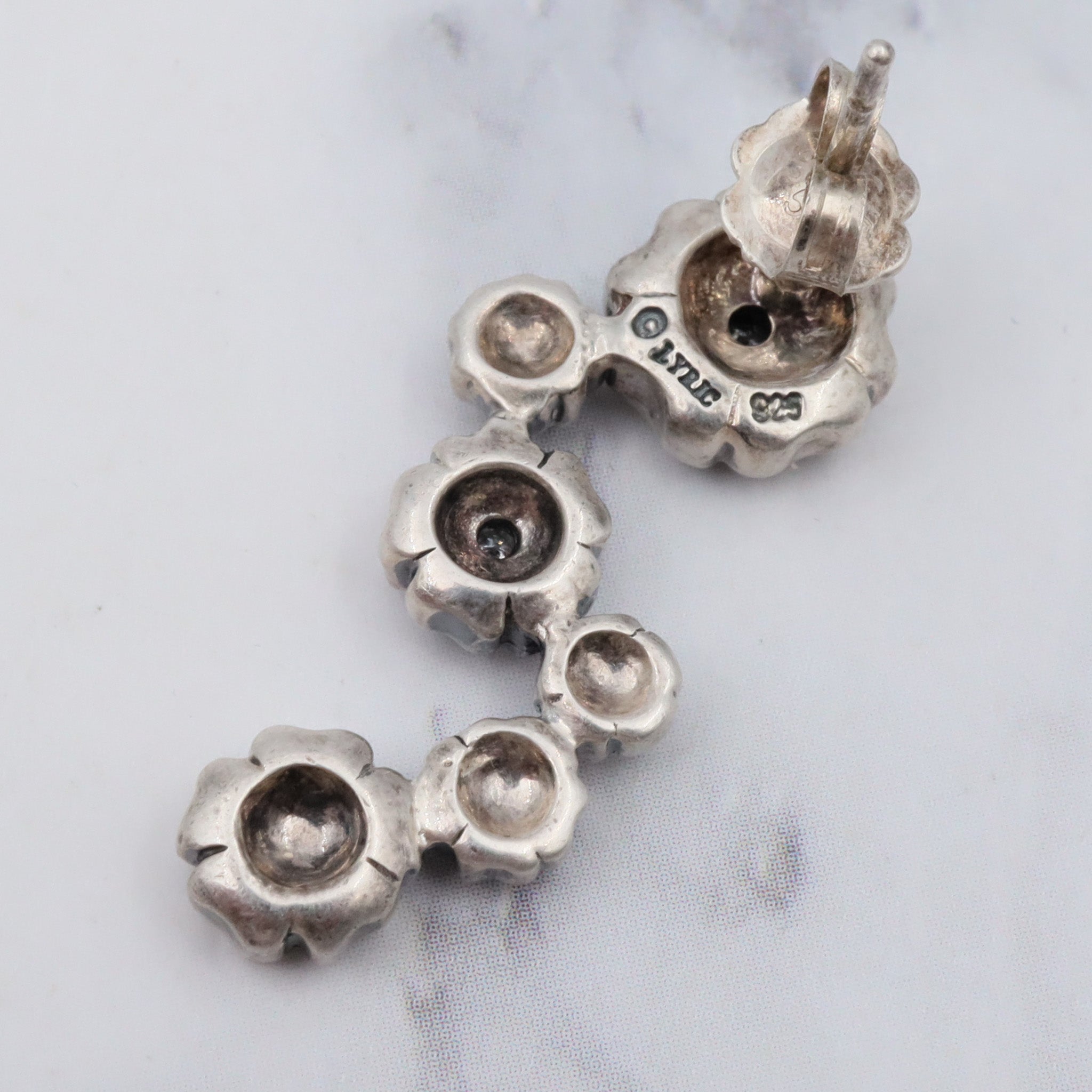 Vintage sterling & diamond flower earrings by “Lyric”