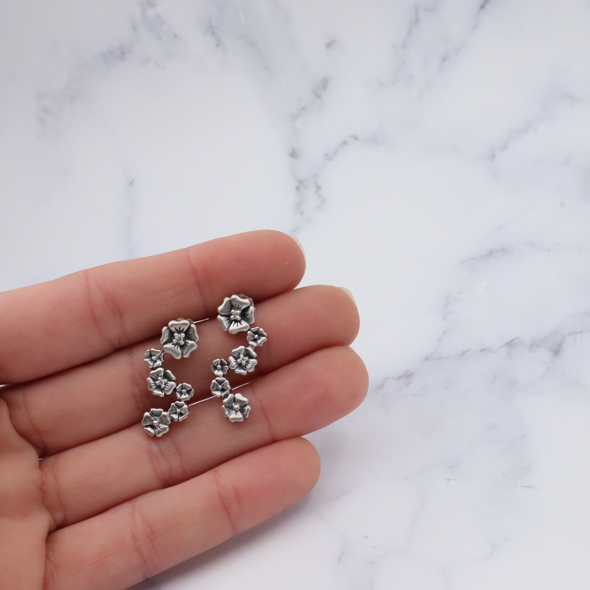 Vintage sterling & diamond flower earrings by “Lyric”