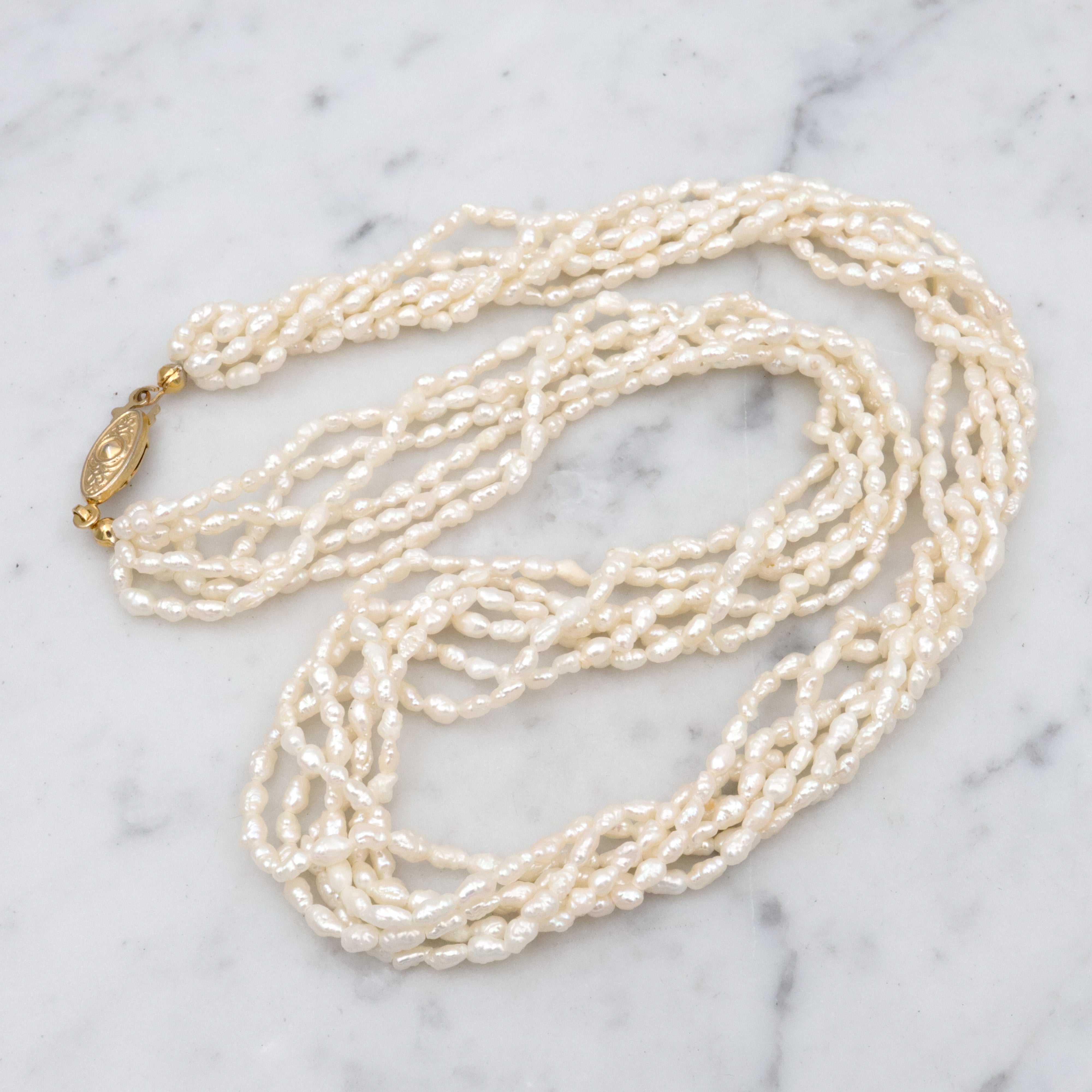 Six-strand baroque pearl twist necklace, 17"