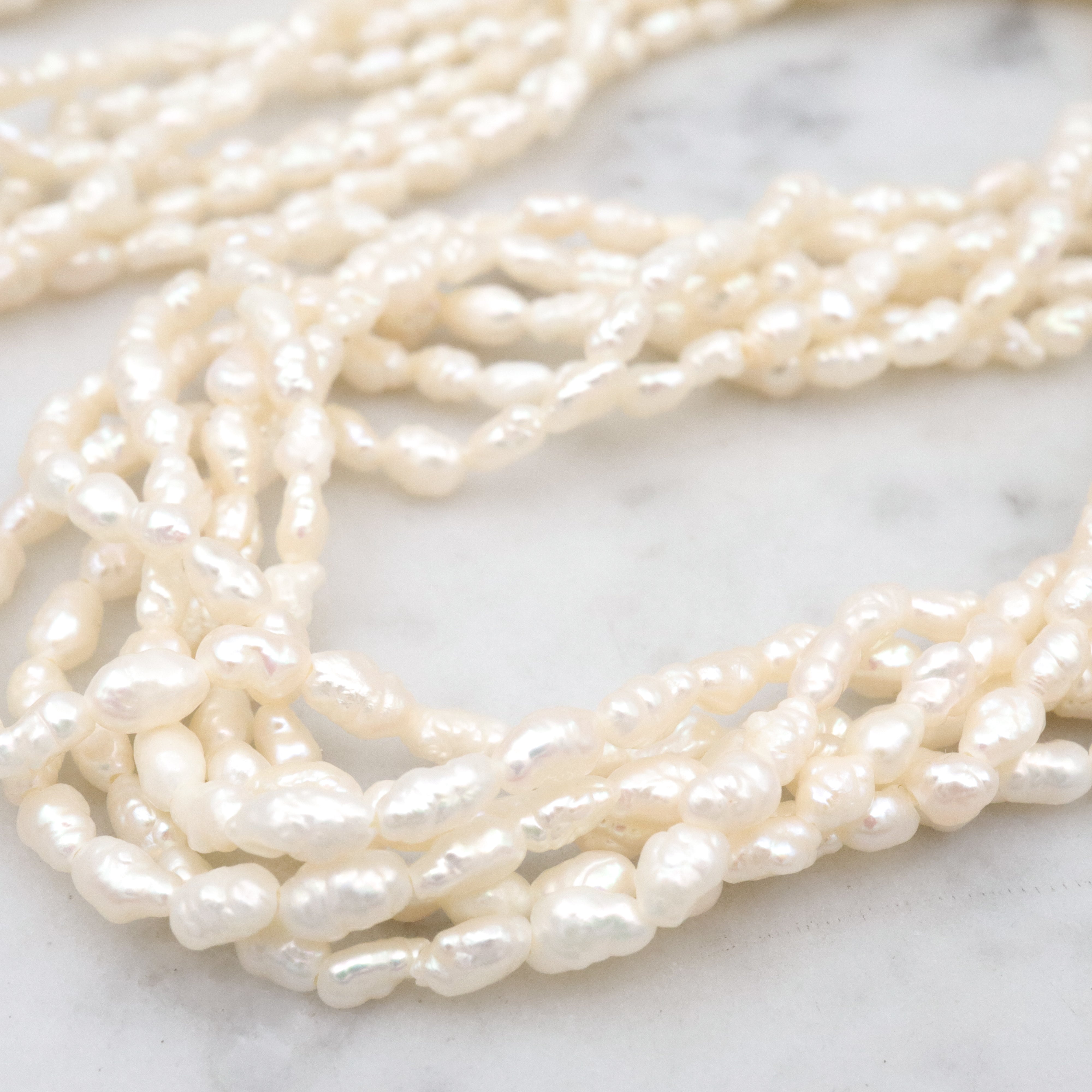 Six-strand baroque pearl twist necklace, 17"