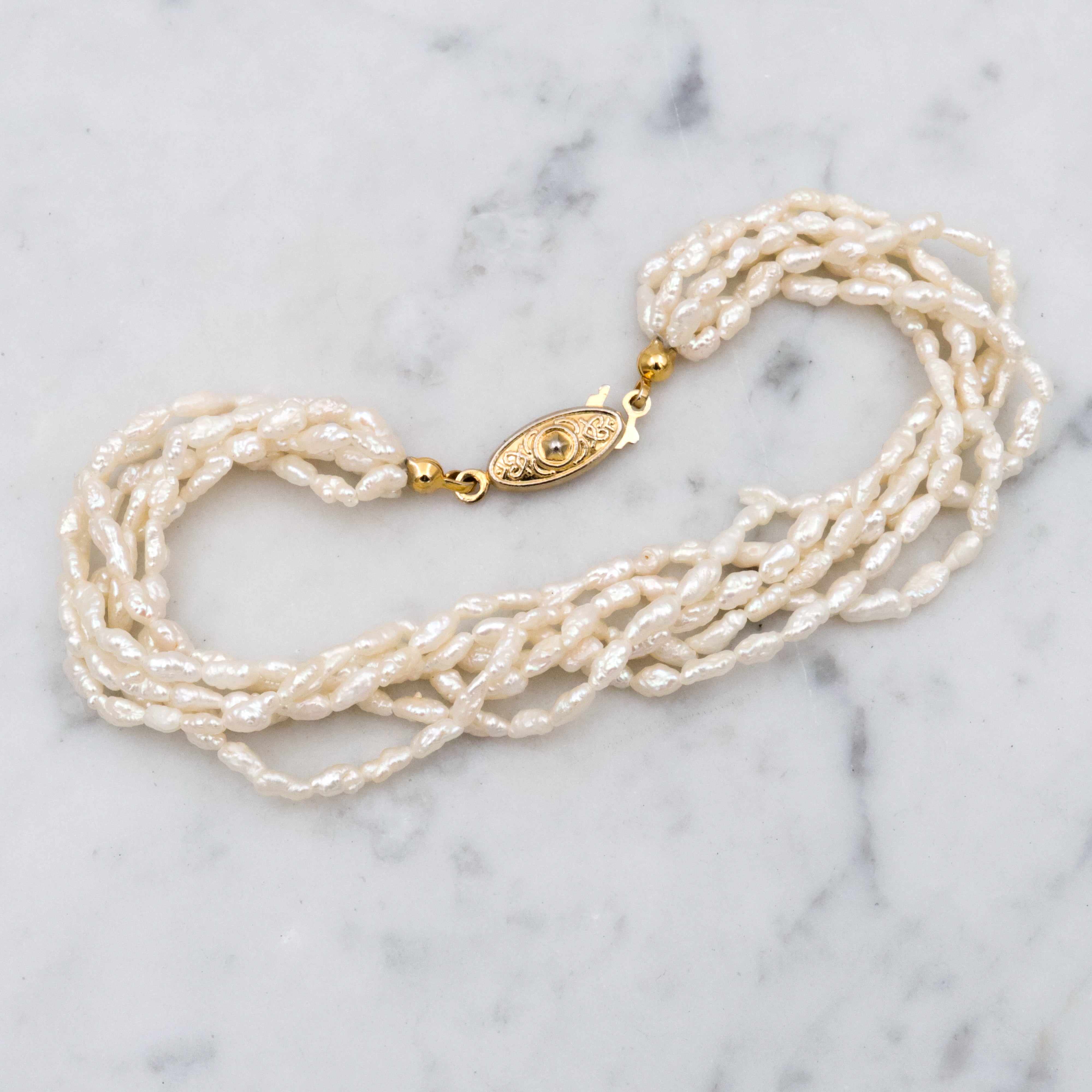 Six-strand baroque pearl twist bracelet, 8"