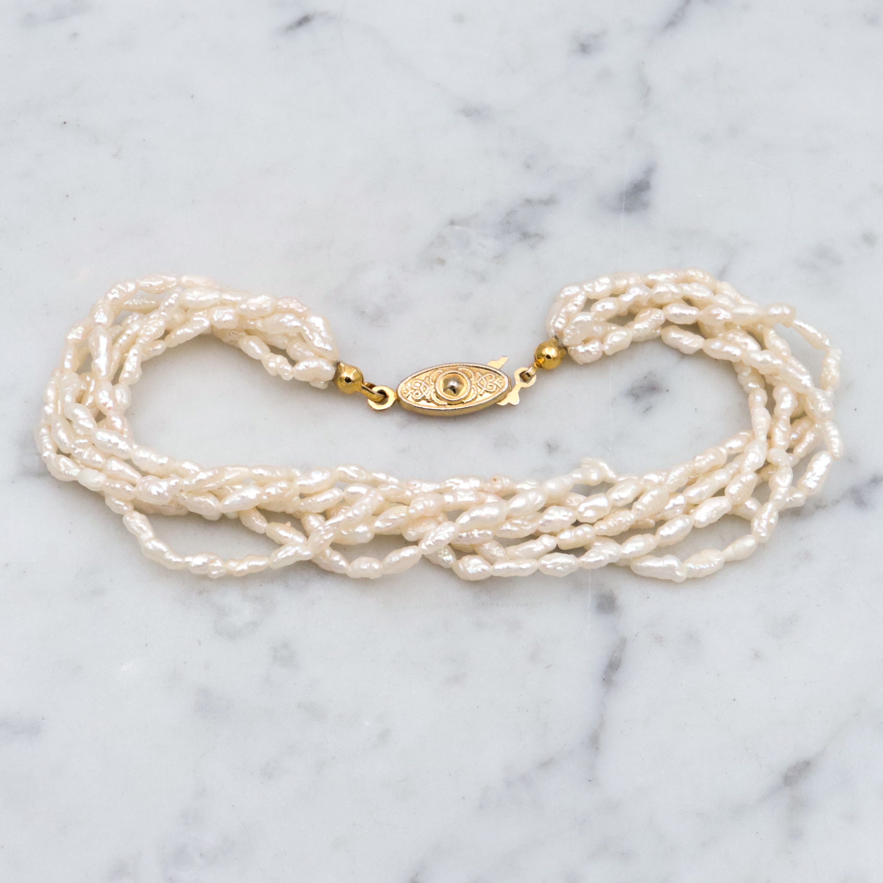 Six-strand baroque pearl twist bracelet, 8"