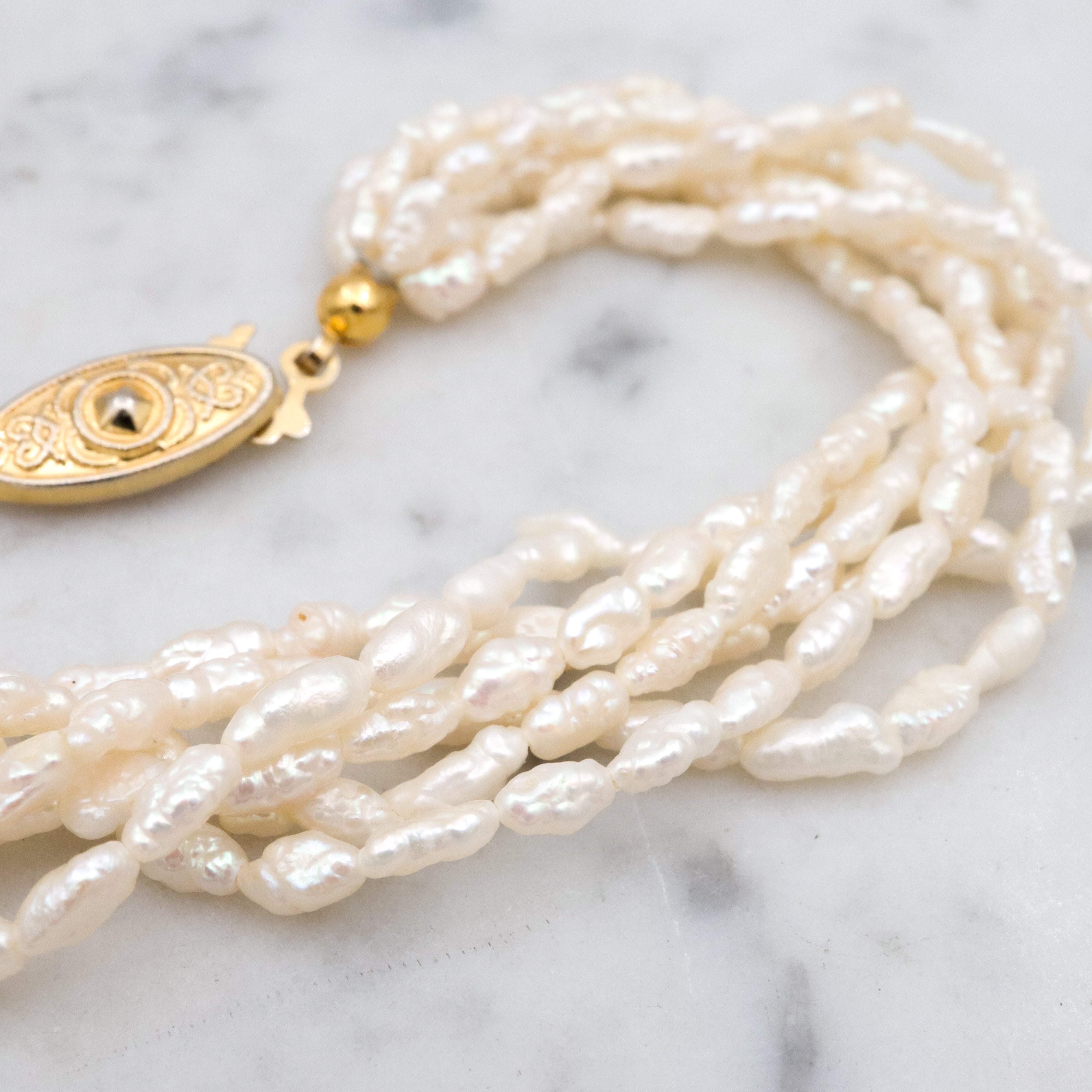 Six-strand baroque pearl twist bracelet, 8"