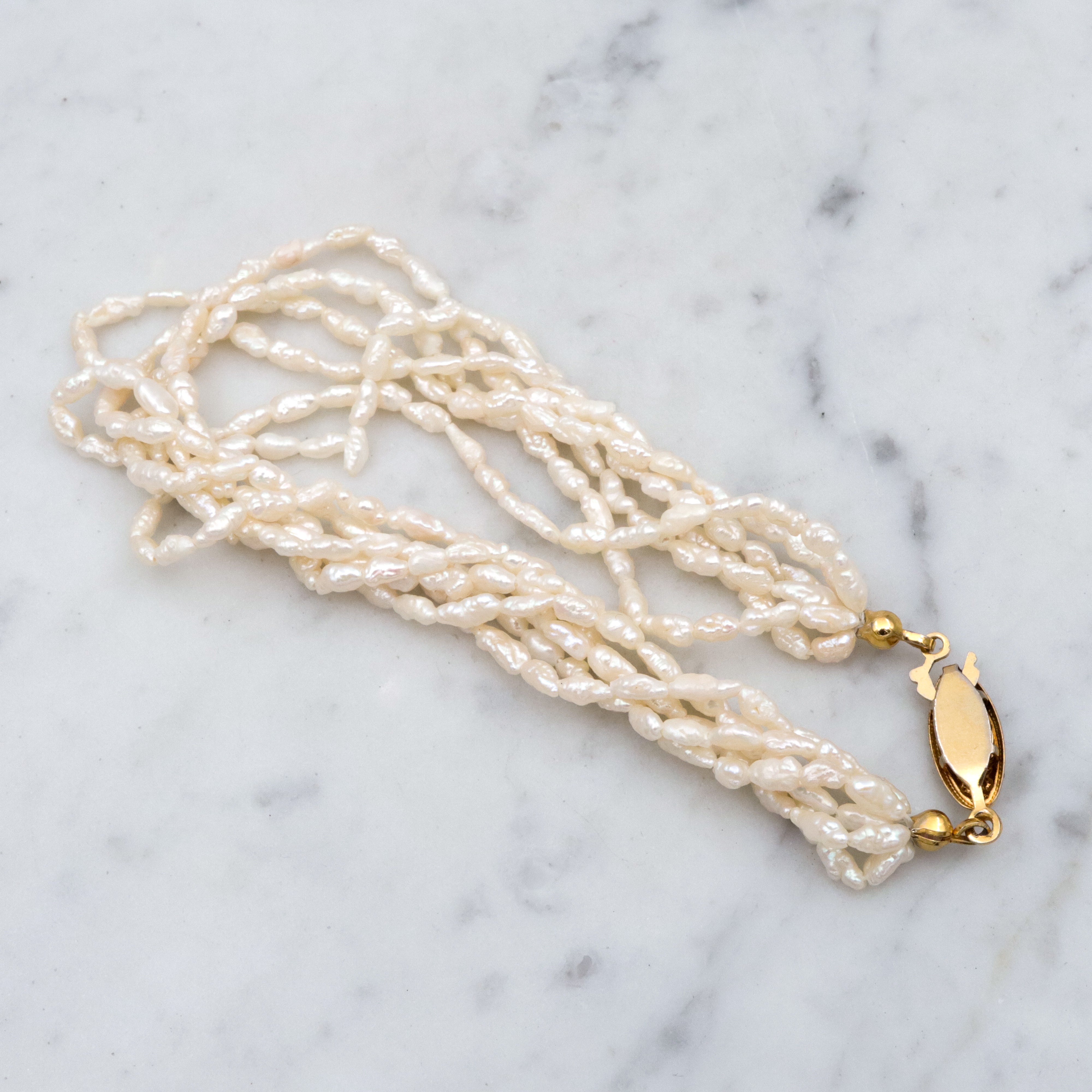 Six-strand baroque pearl twist bracelet, 8"