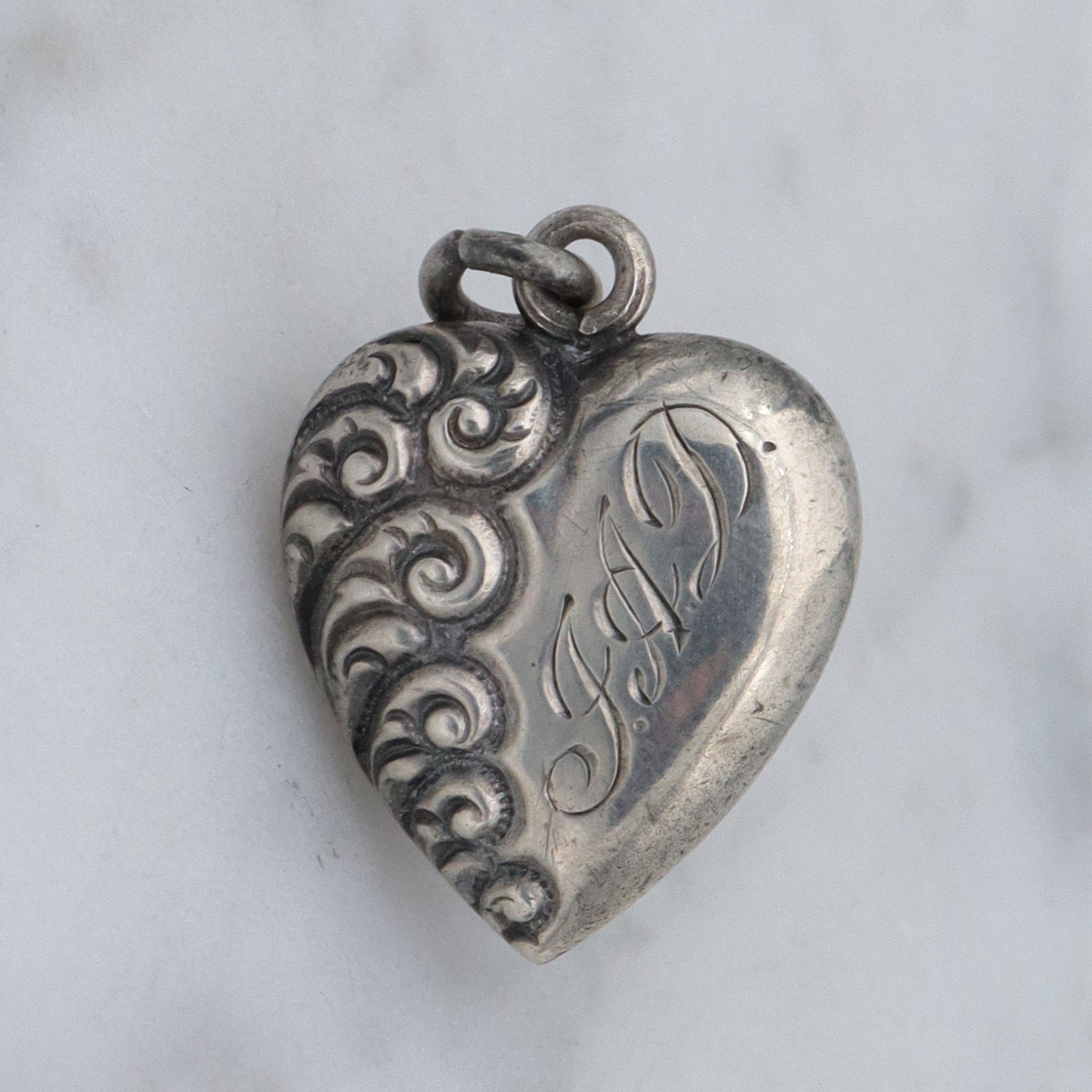 Antique Victorian repousse puffy heart charm pendant with monogram “J.A.D”