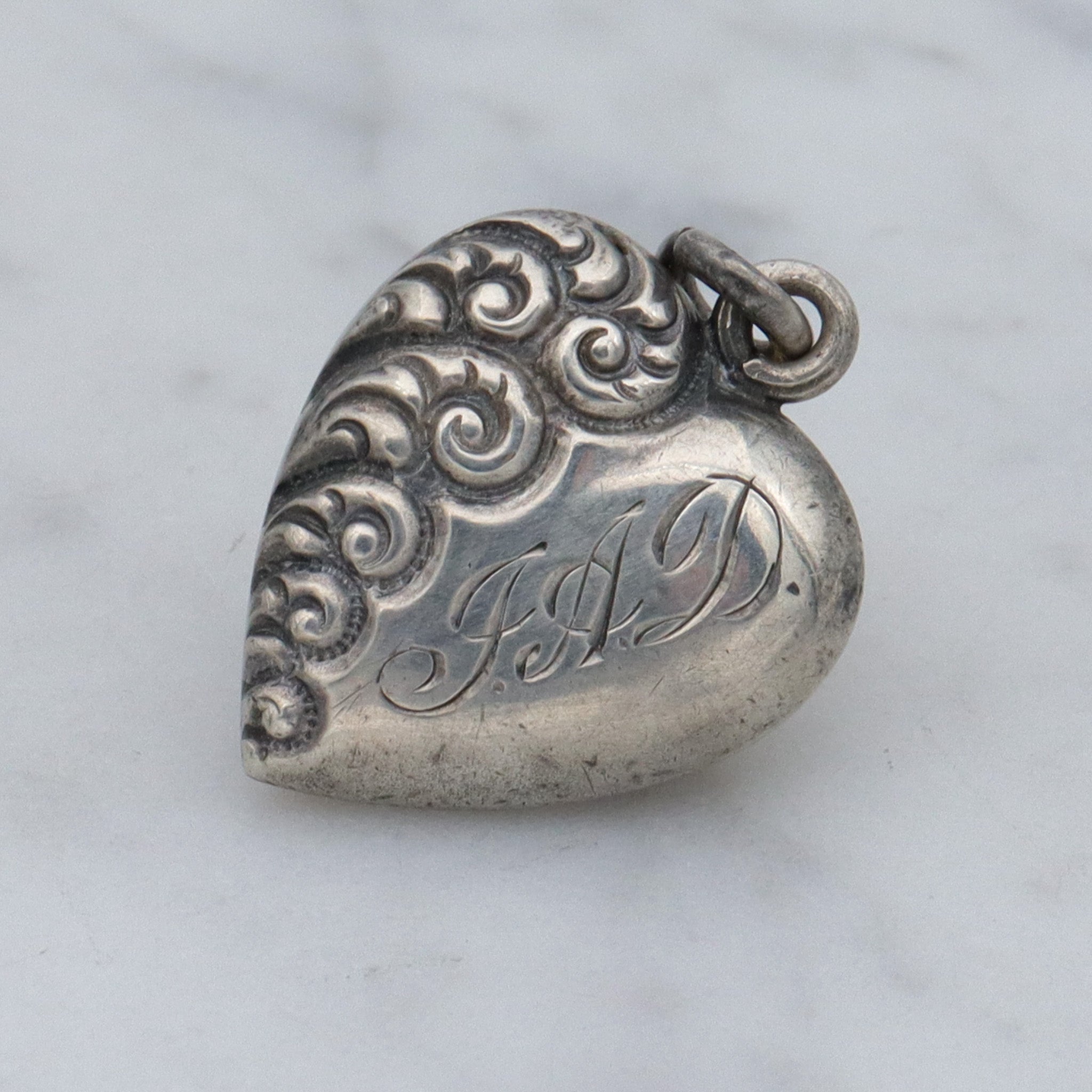 Antique Victorian repousse puffy heart charm pendant with monogram “J.A.D”