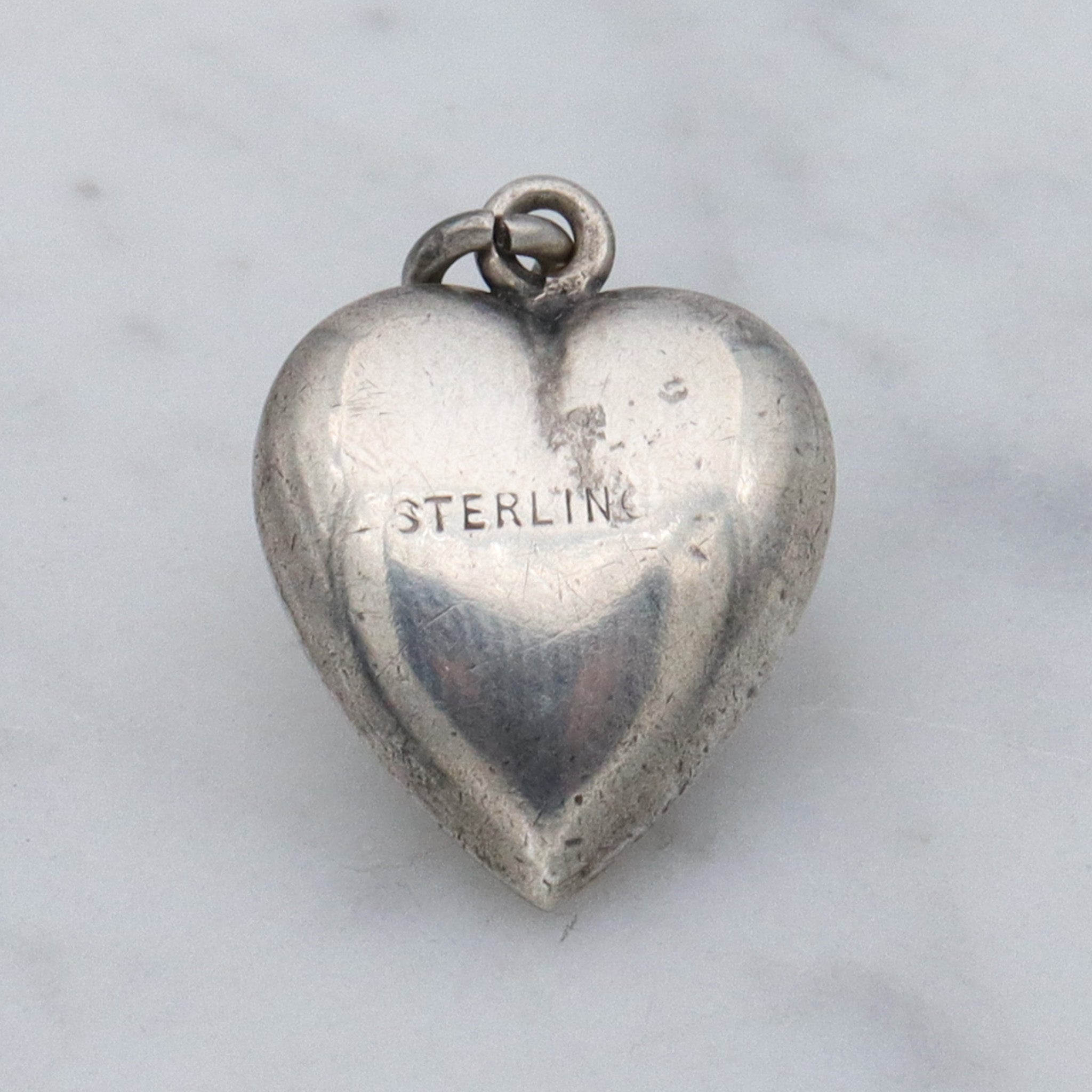 Antique Victorian repousse puffy heart charm pendant with monogram “J.A.D”