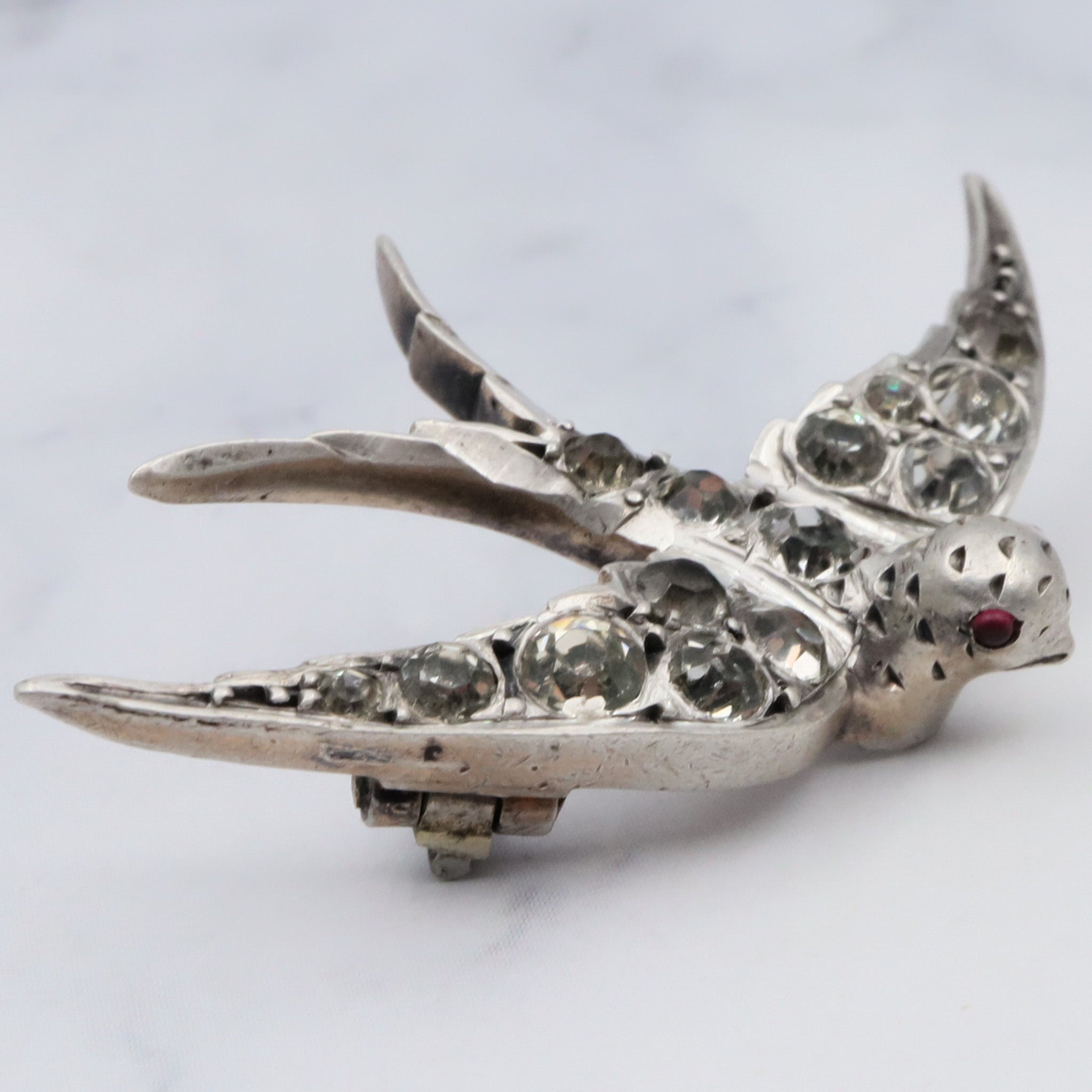 Antique Victorian .900 European handmade silver & paste gems swallow bird pin with ruby glass eyes