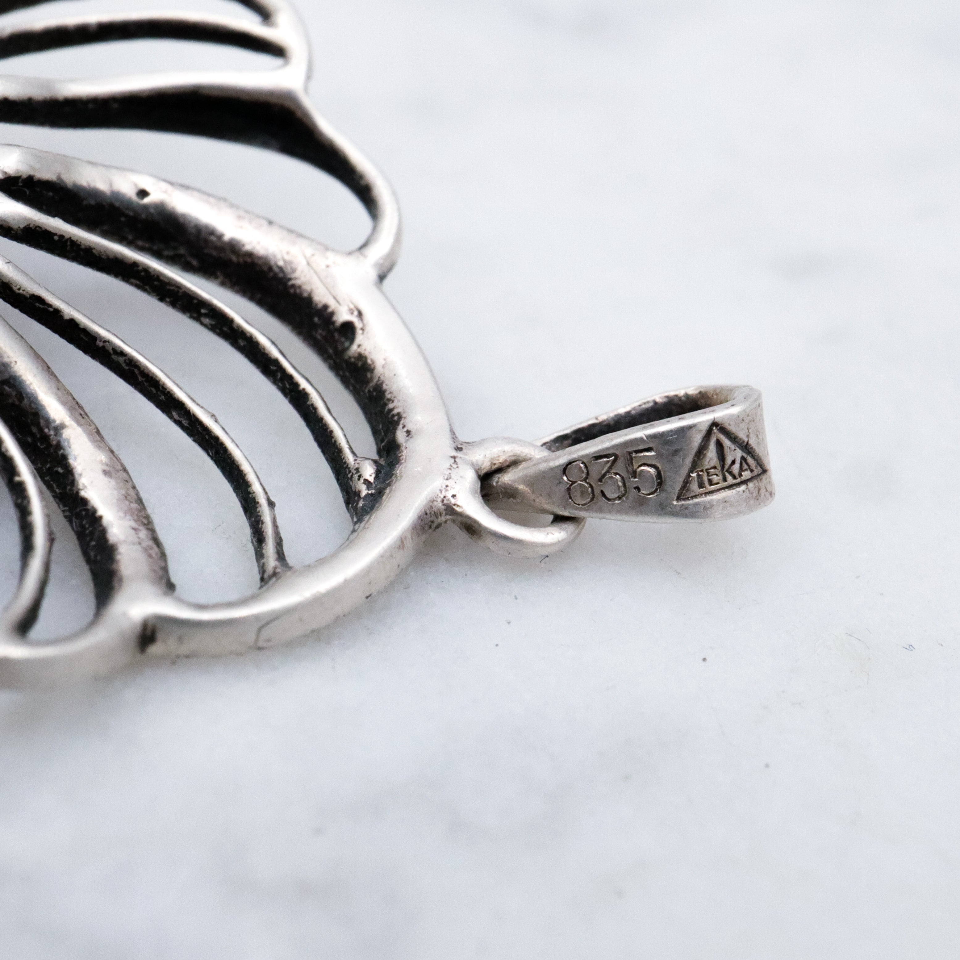 Mid Century Theodor Klotz Germany 835 silver, amber, and marcasite spiral pendant