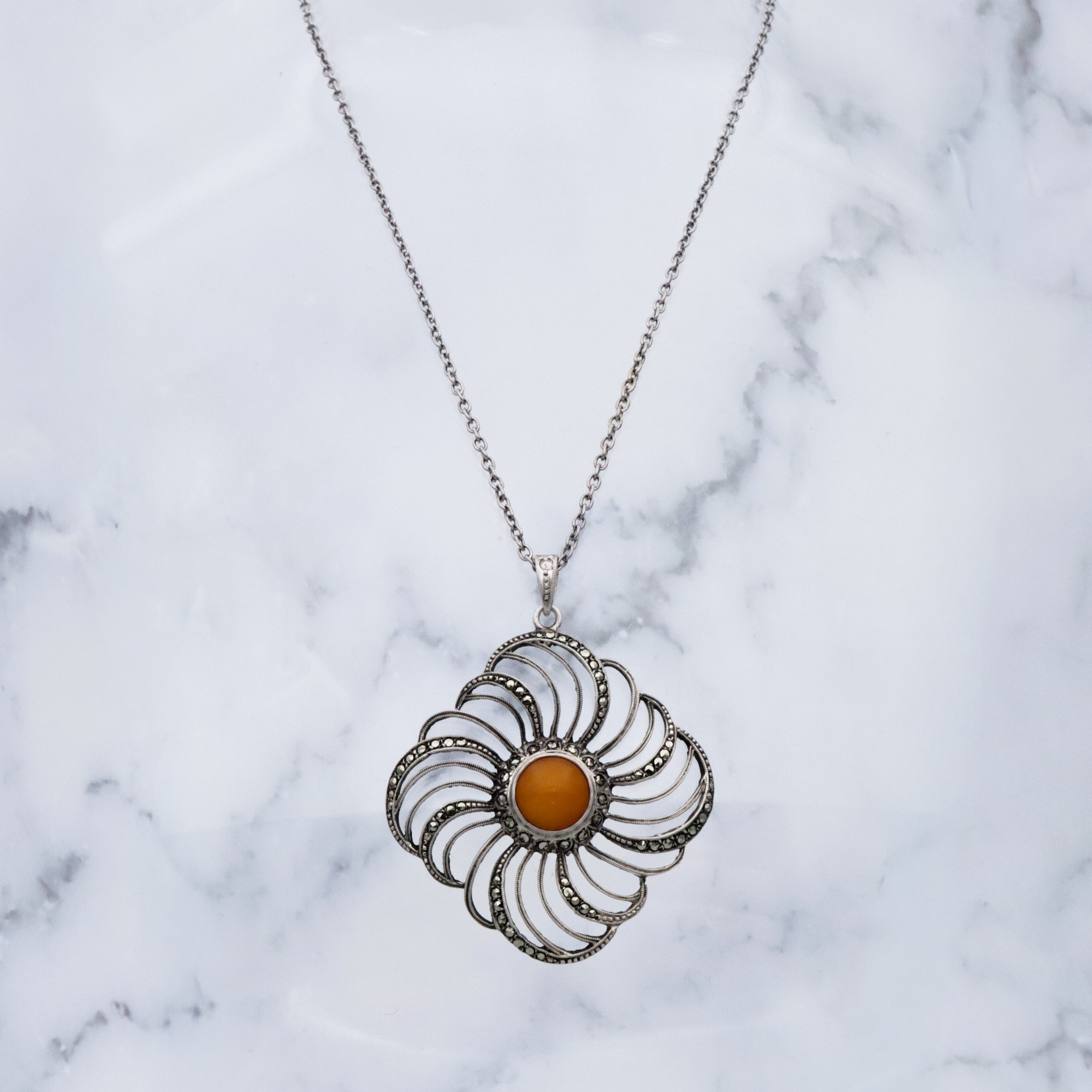 Mid Century Theodor Klotz Germany 835 silver, amber, and marcasite spiral pendant