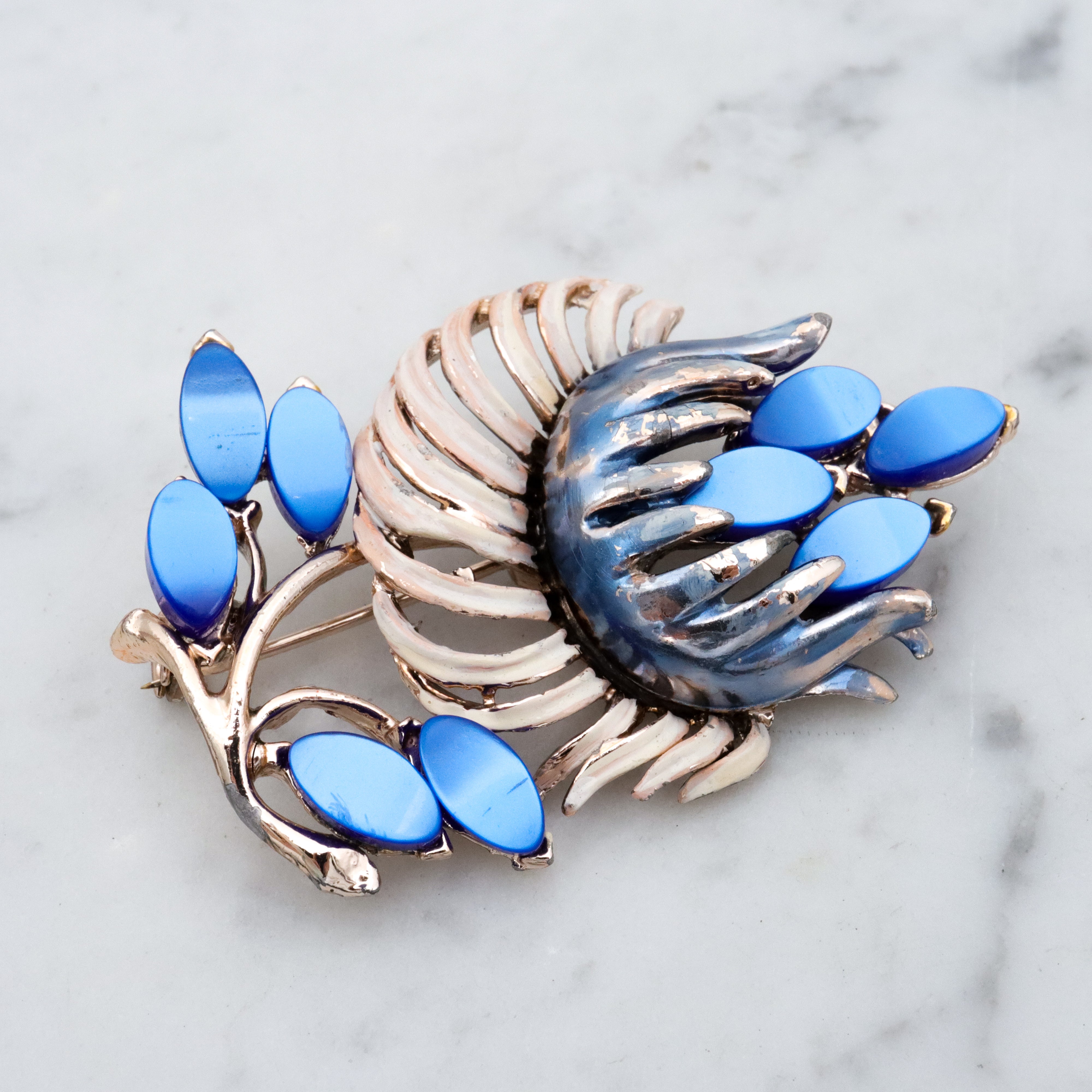 Vintage blue thermoset painted flower brooch
