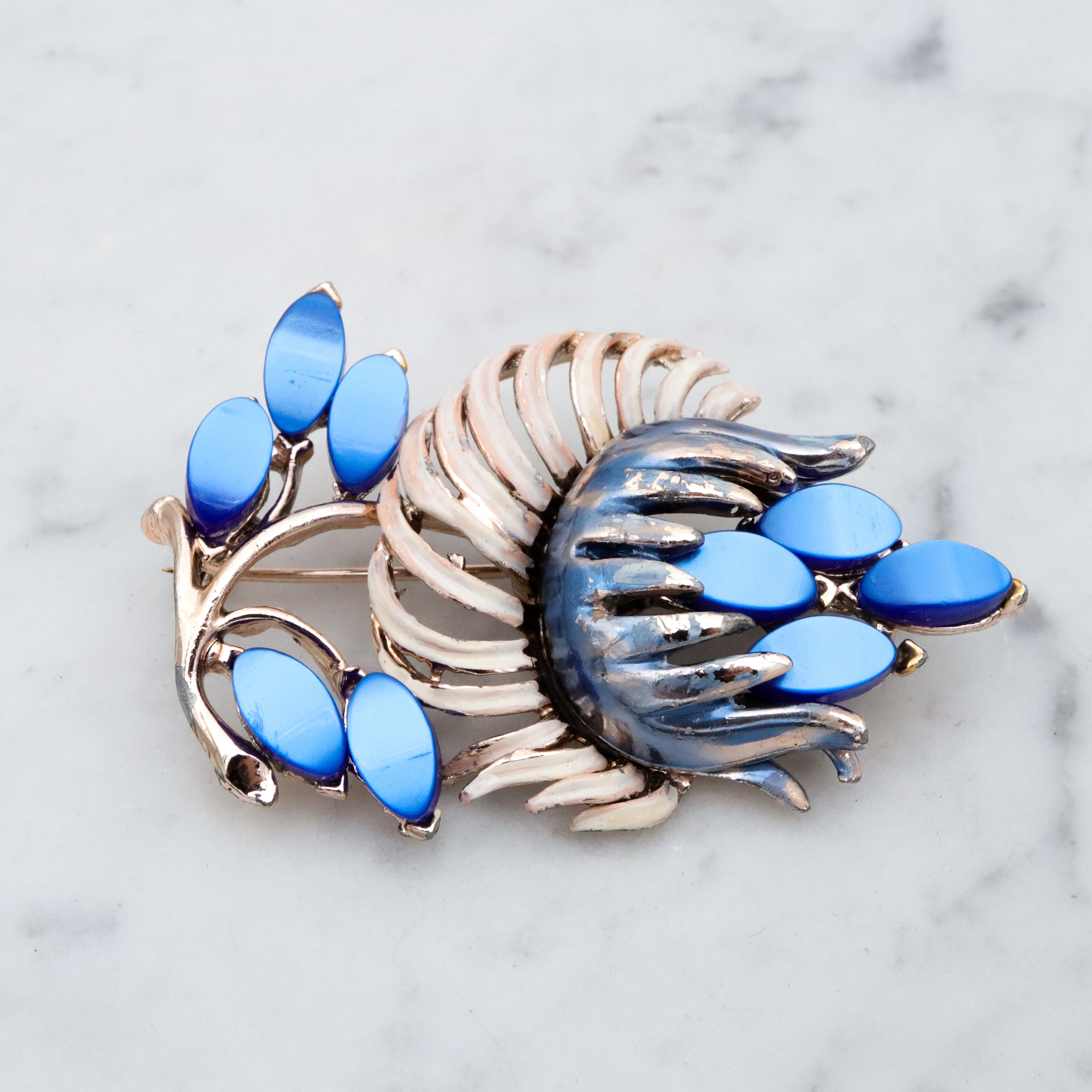 Vintage blue thermoset painted flower brooch