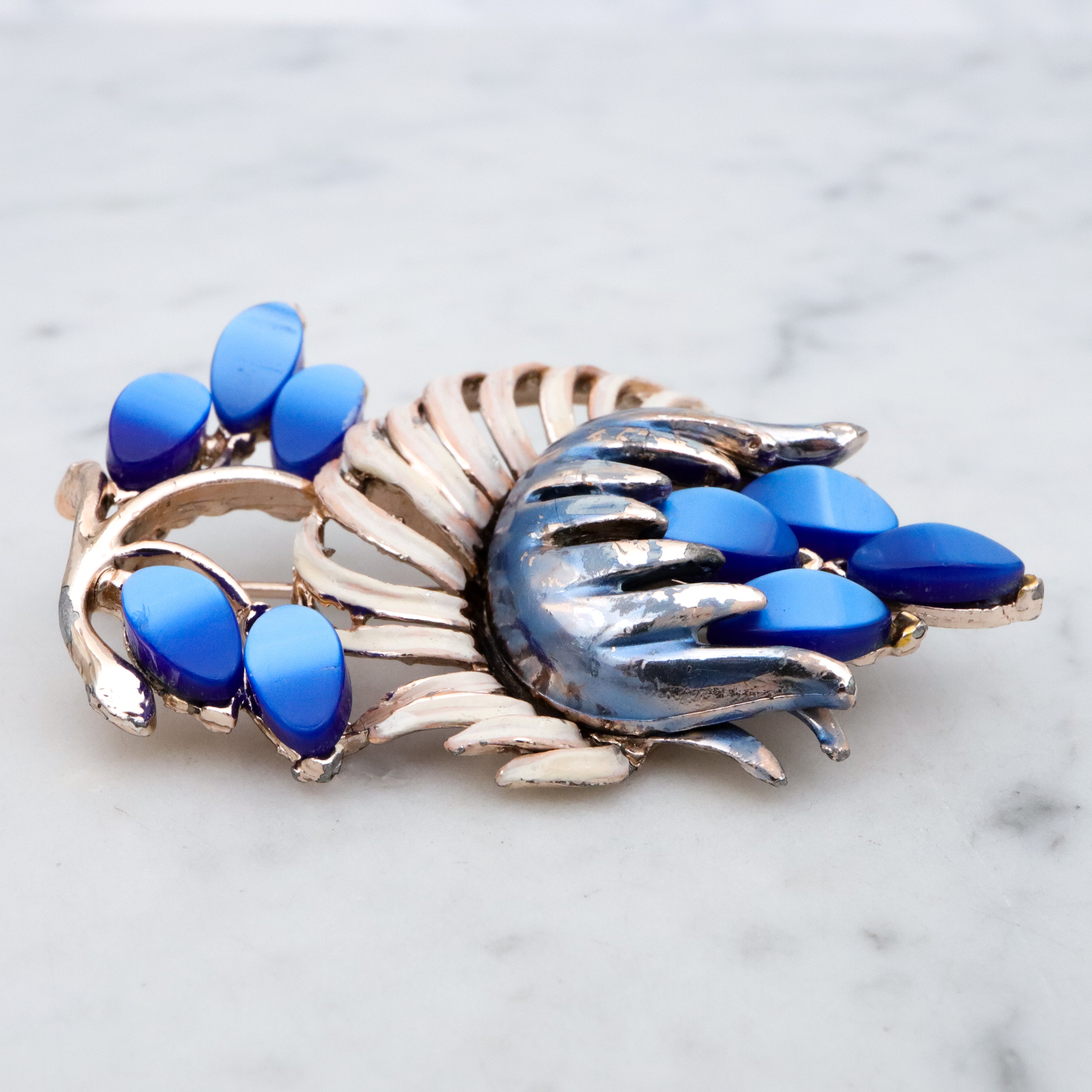 Vintage blue thermoset painted flower brooch