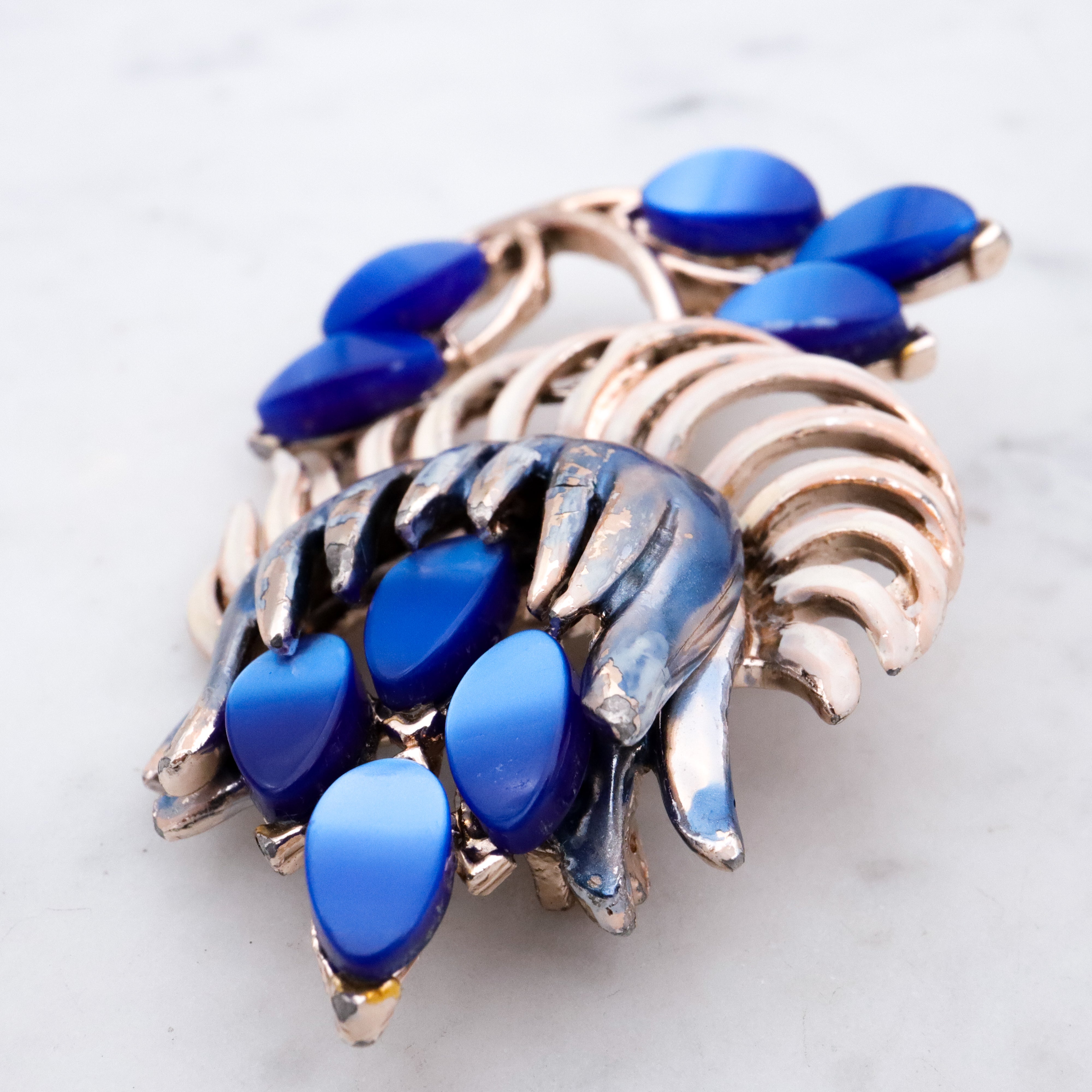 Vintage blue thermoset painted flower brooch