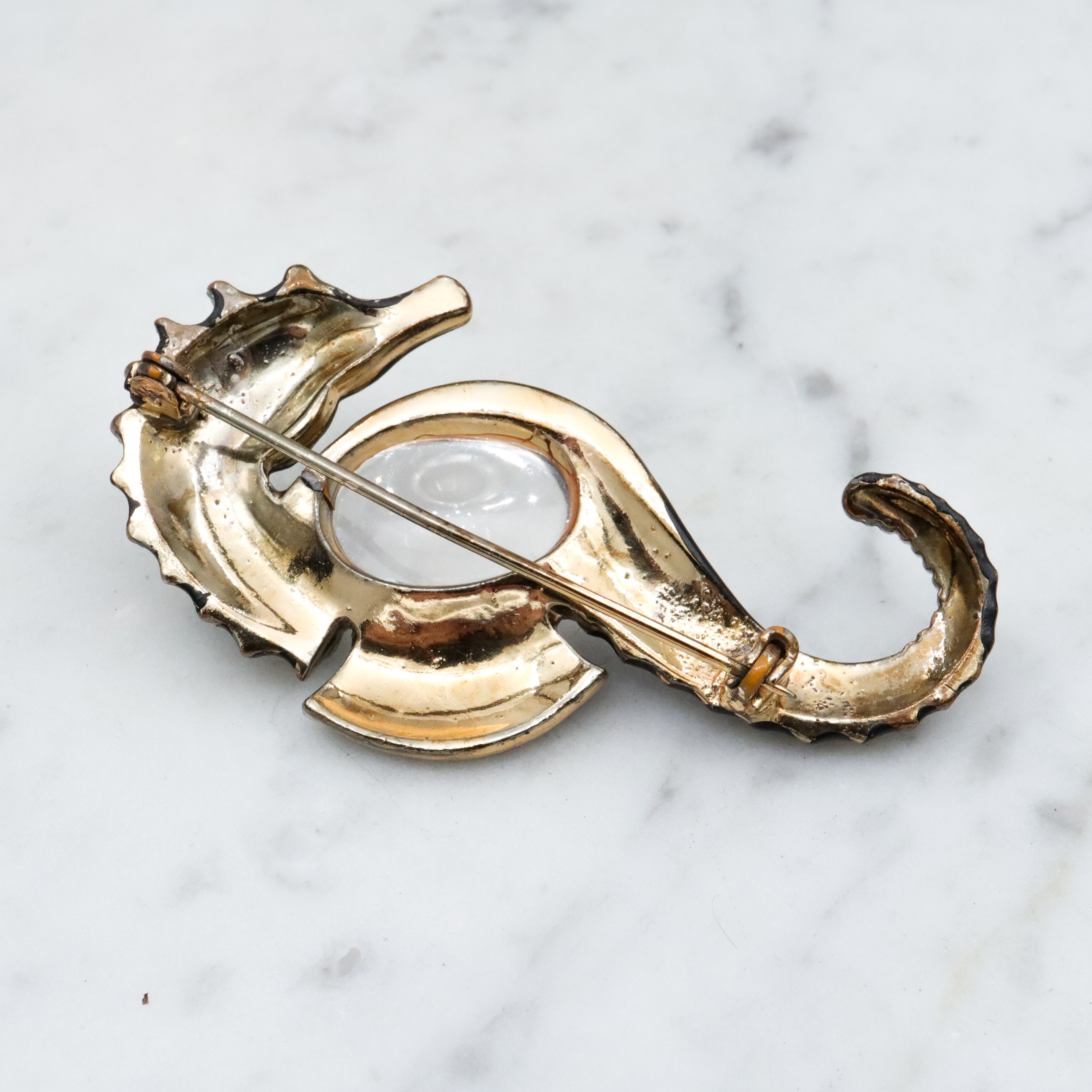 40s black painted seahorse jelly belly brooch