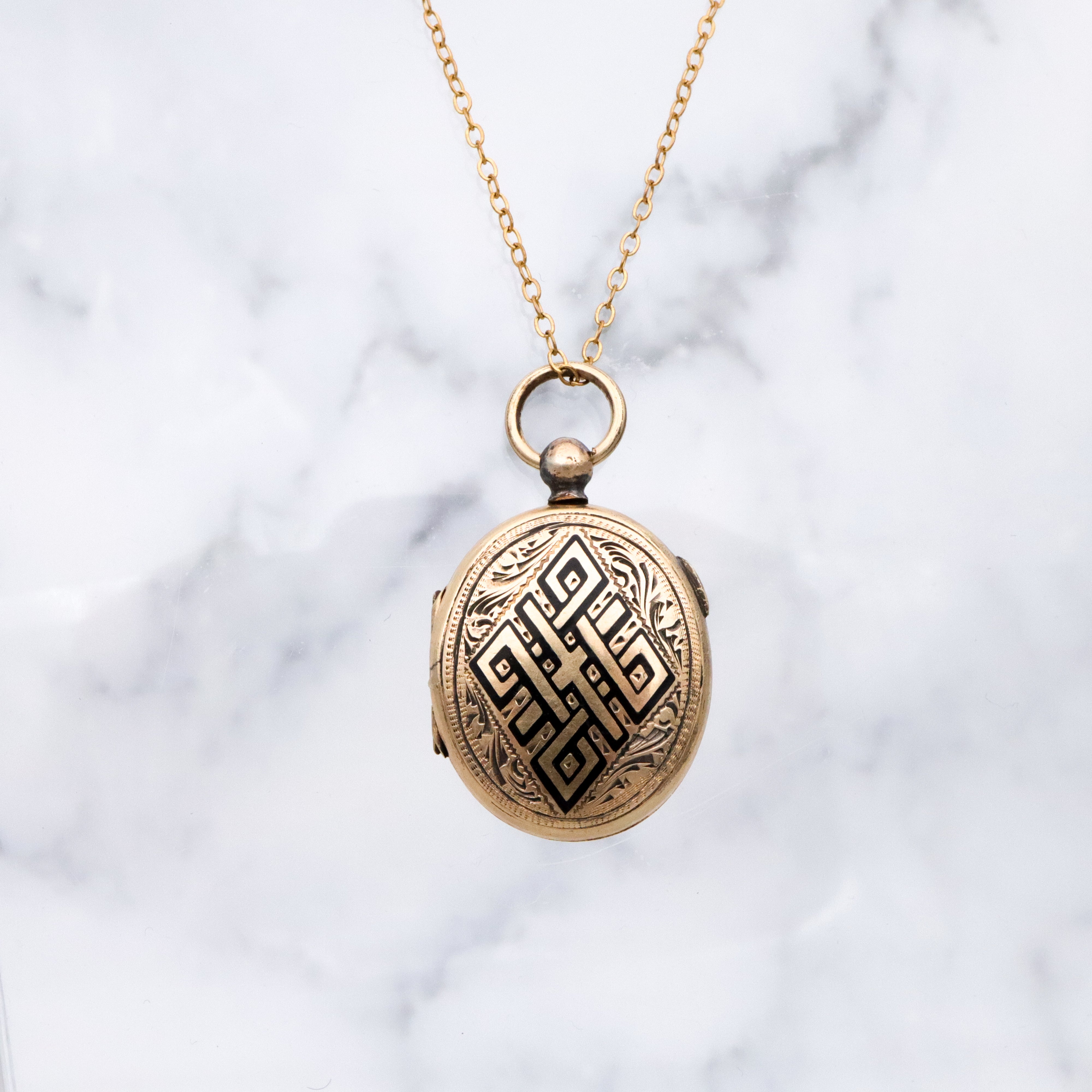 Antique 14k gold taille d'épargne enamel mourning locket