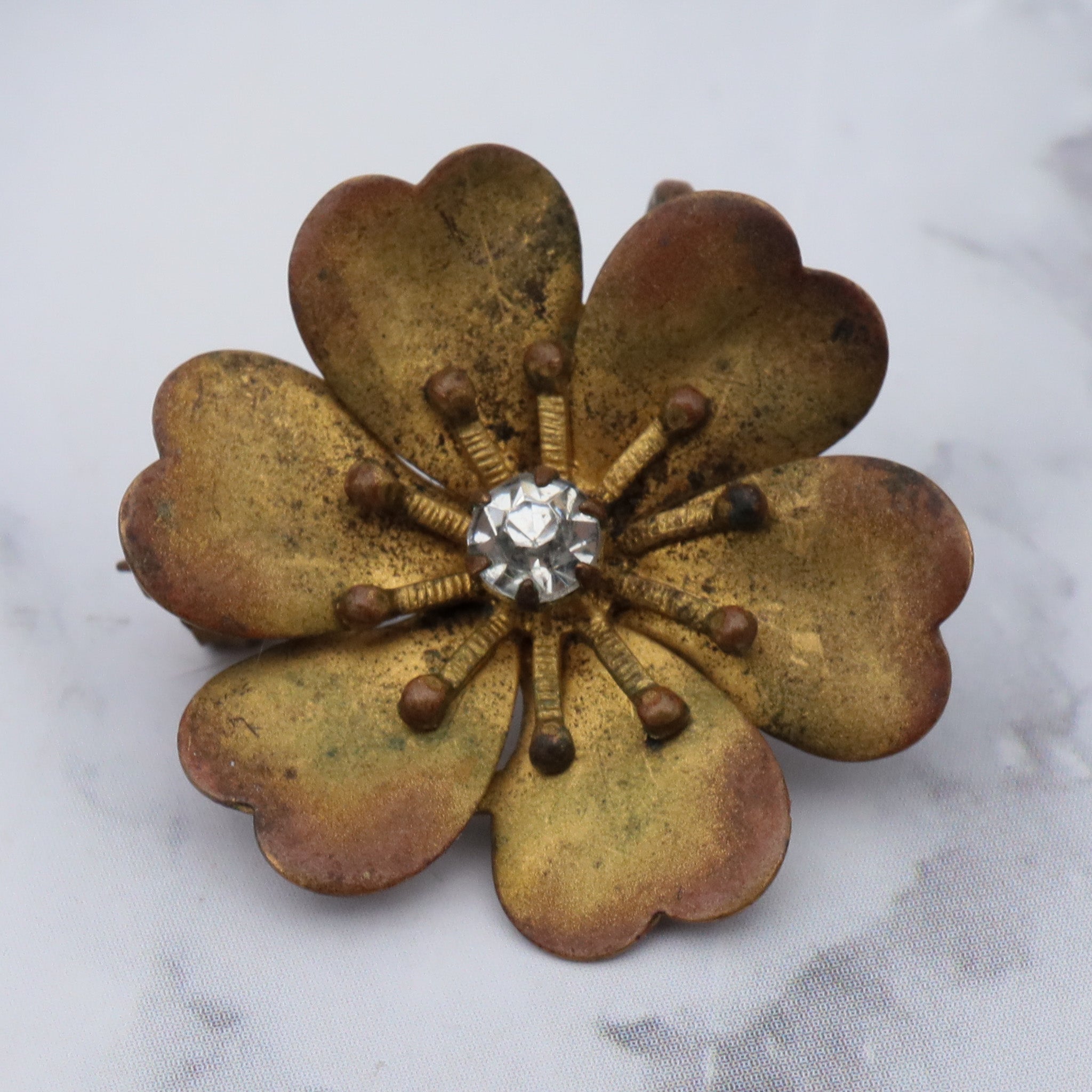 Antique Victorian painted brass & rhinestone flower brooch with pendant loop