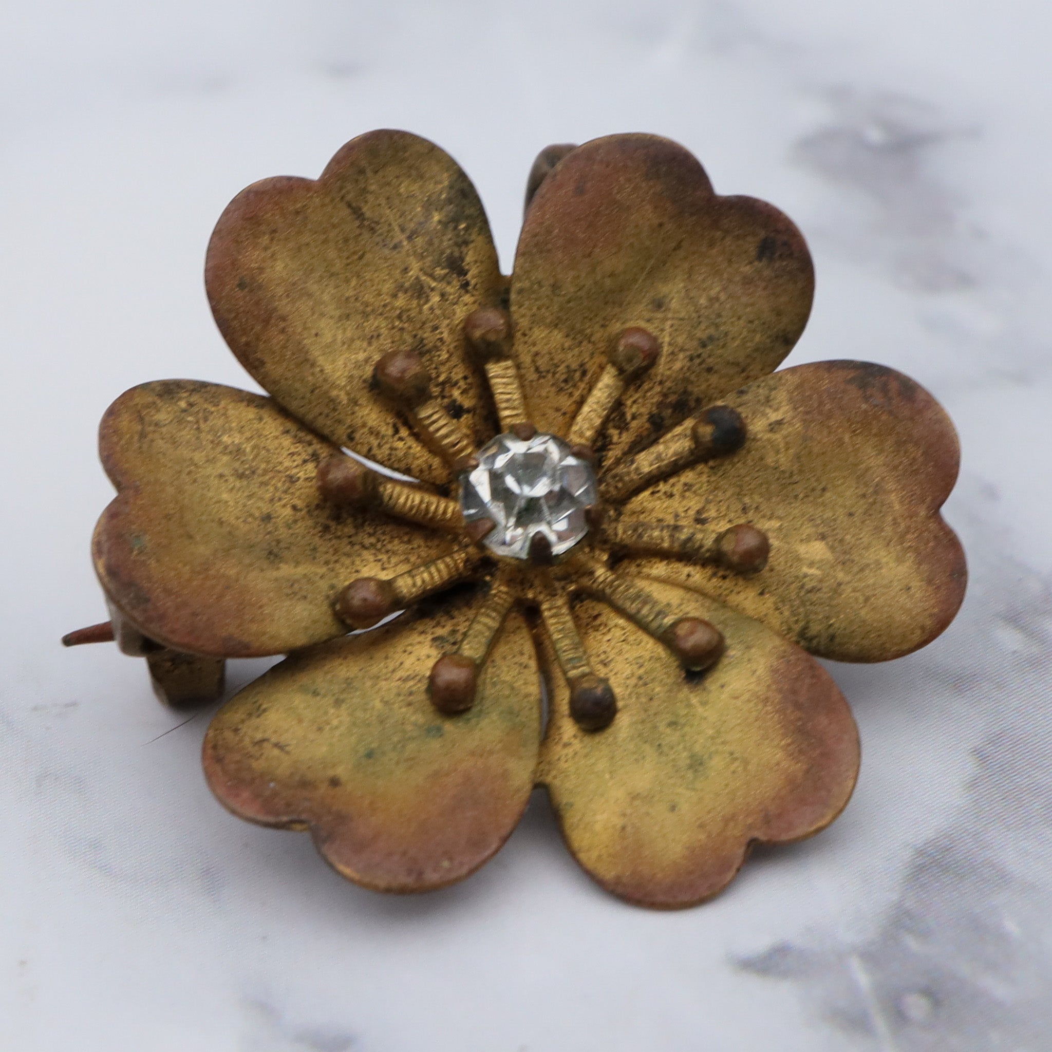 Antique Victorian painted brass & rhinestone flower brooch with pendant loop