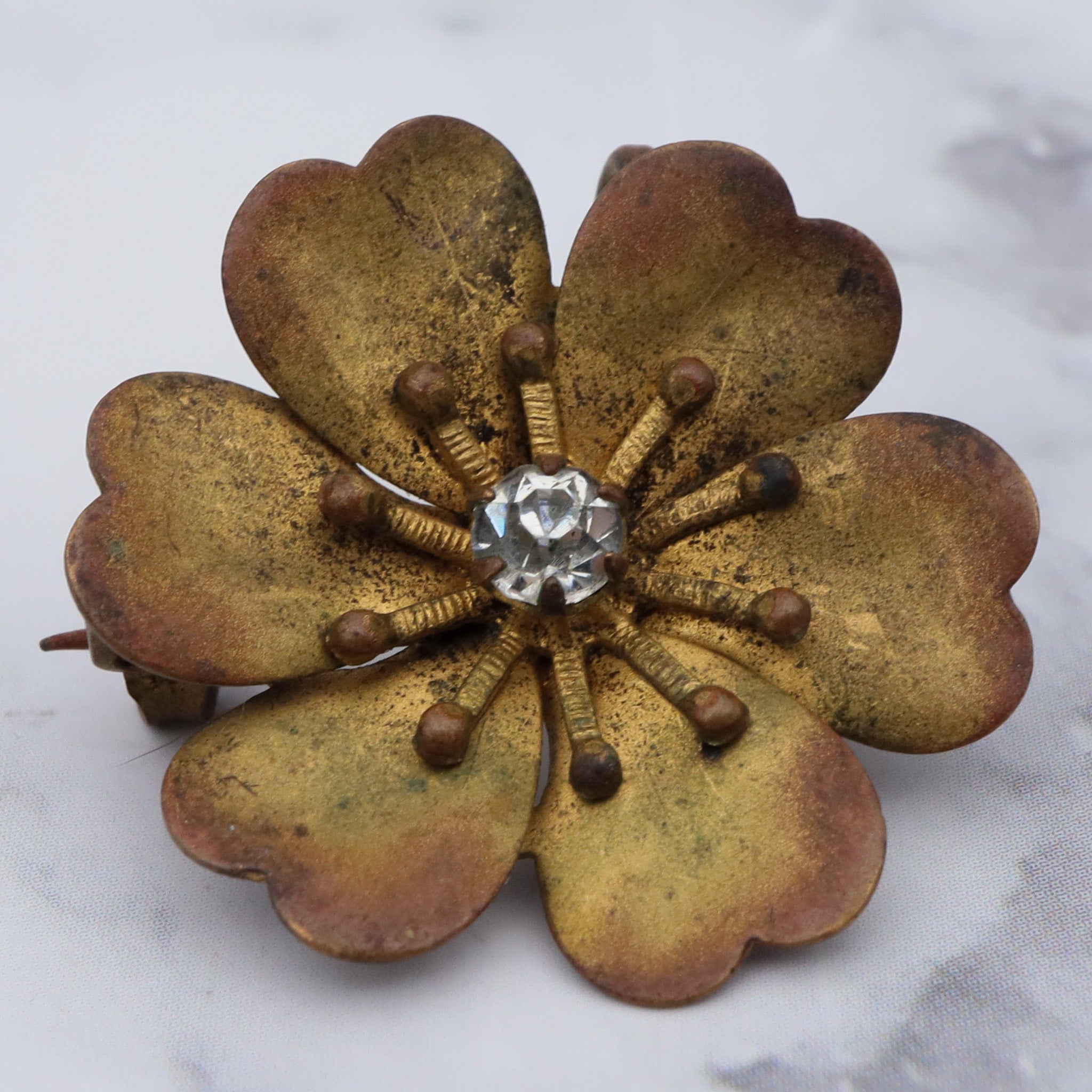 Antique Victorian painted brass & rhinestone flower brooch with pendant loop